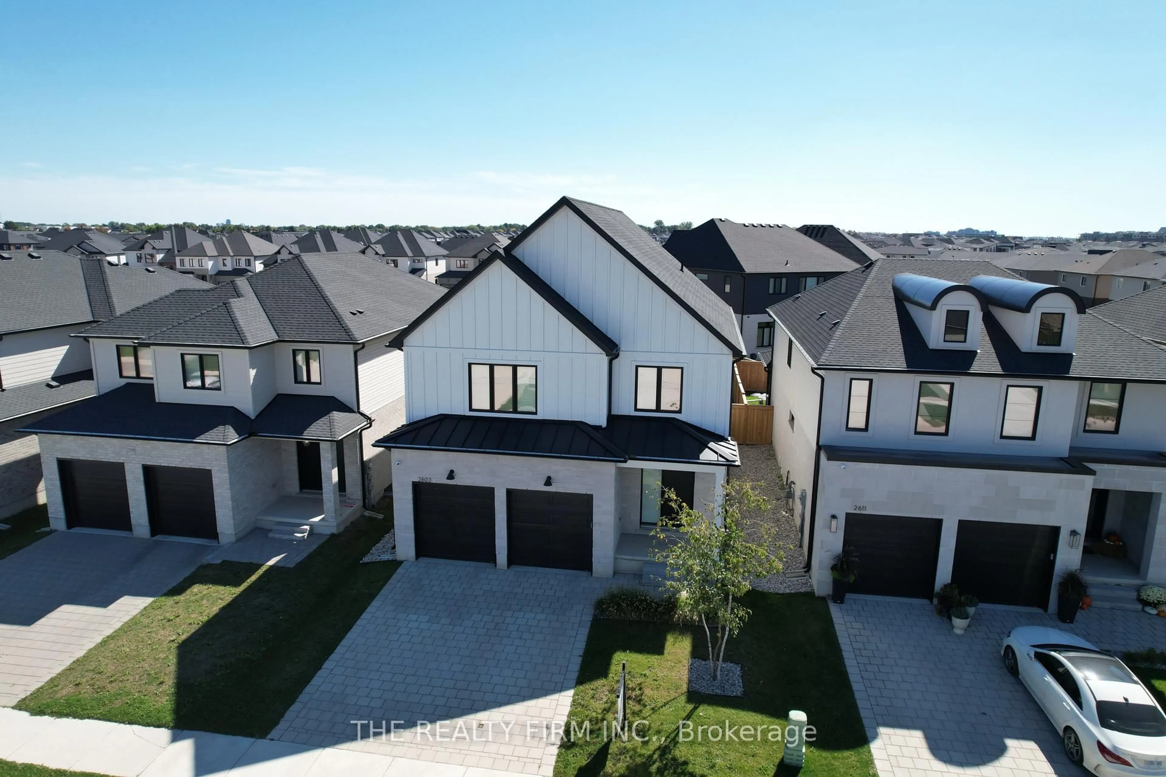 A pic from outside/outdoor area/front of a property/back of a property/a pic from drone, street for 2603 Buroak Dr, London North Ontario N6G 3W1
