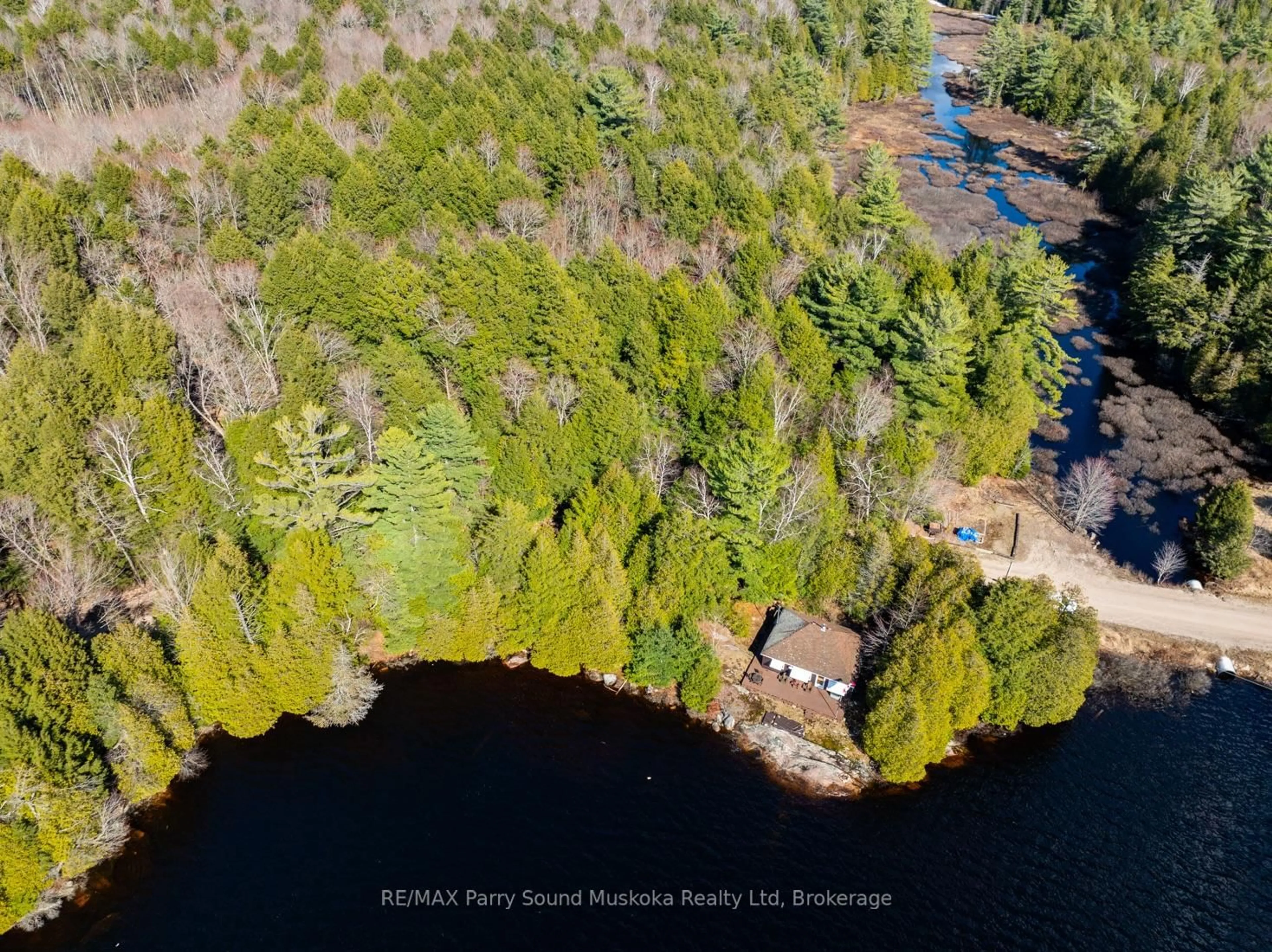 A pic from outside/outdoor area/front of a property/back of a property/a pic from drone, water/lake/river/ocean view for 764 EAST BEAR LAKE Rd, McMurrich/Monteith Ontario P0A 1Y0