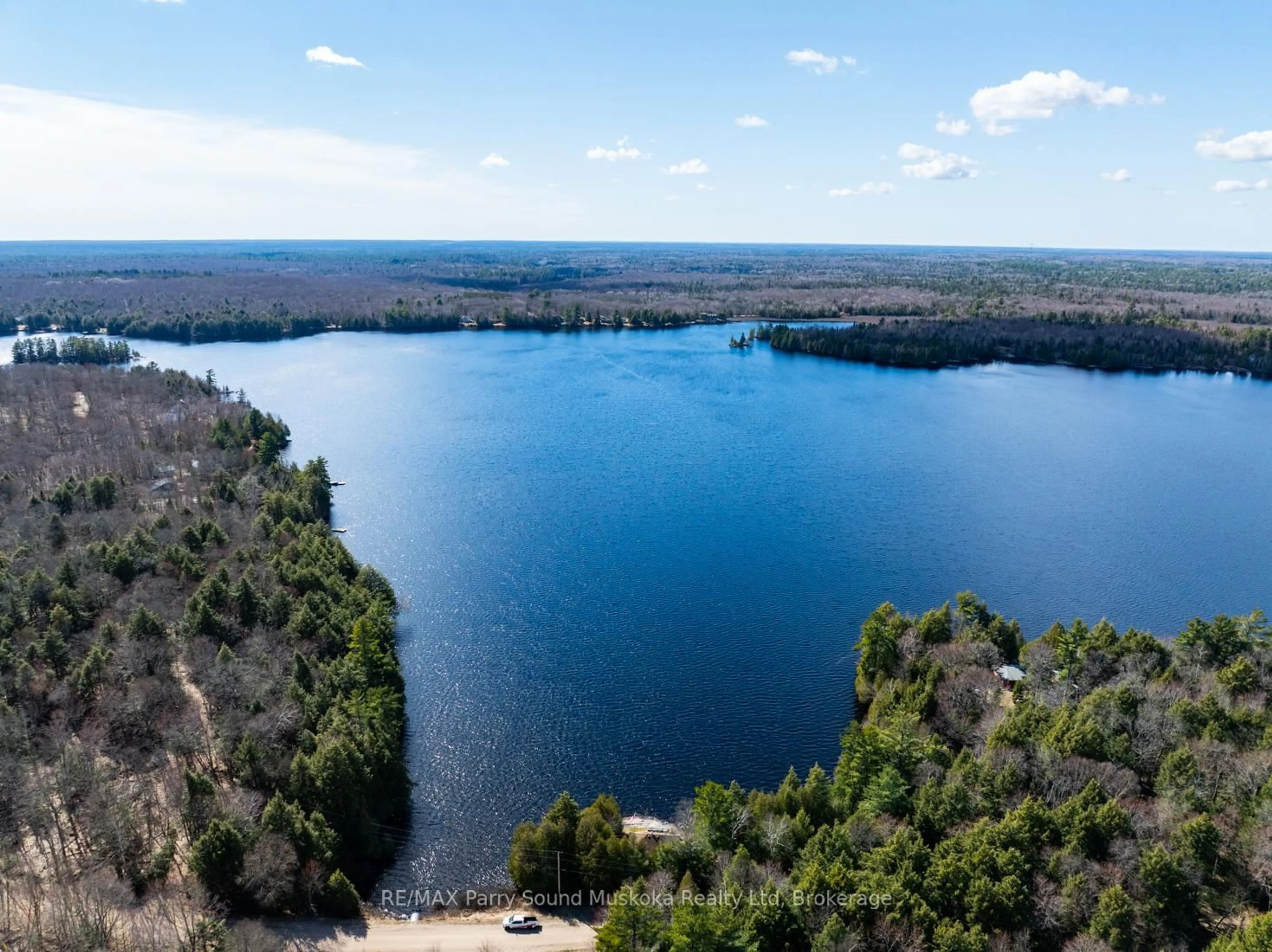 A pic from outside/outdoor area/front of a property/back of a property/a pic from drone, water/lake/river/ocean view for 764 EAST BEAR LAKE Rd, McMurrich/Monteith Ontario P0A 1Y0