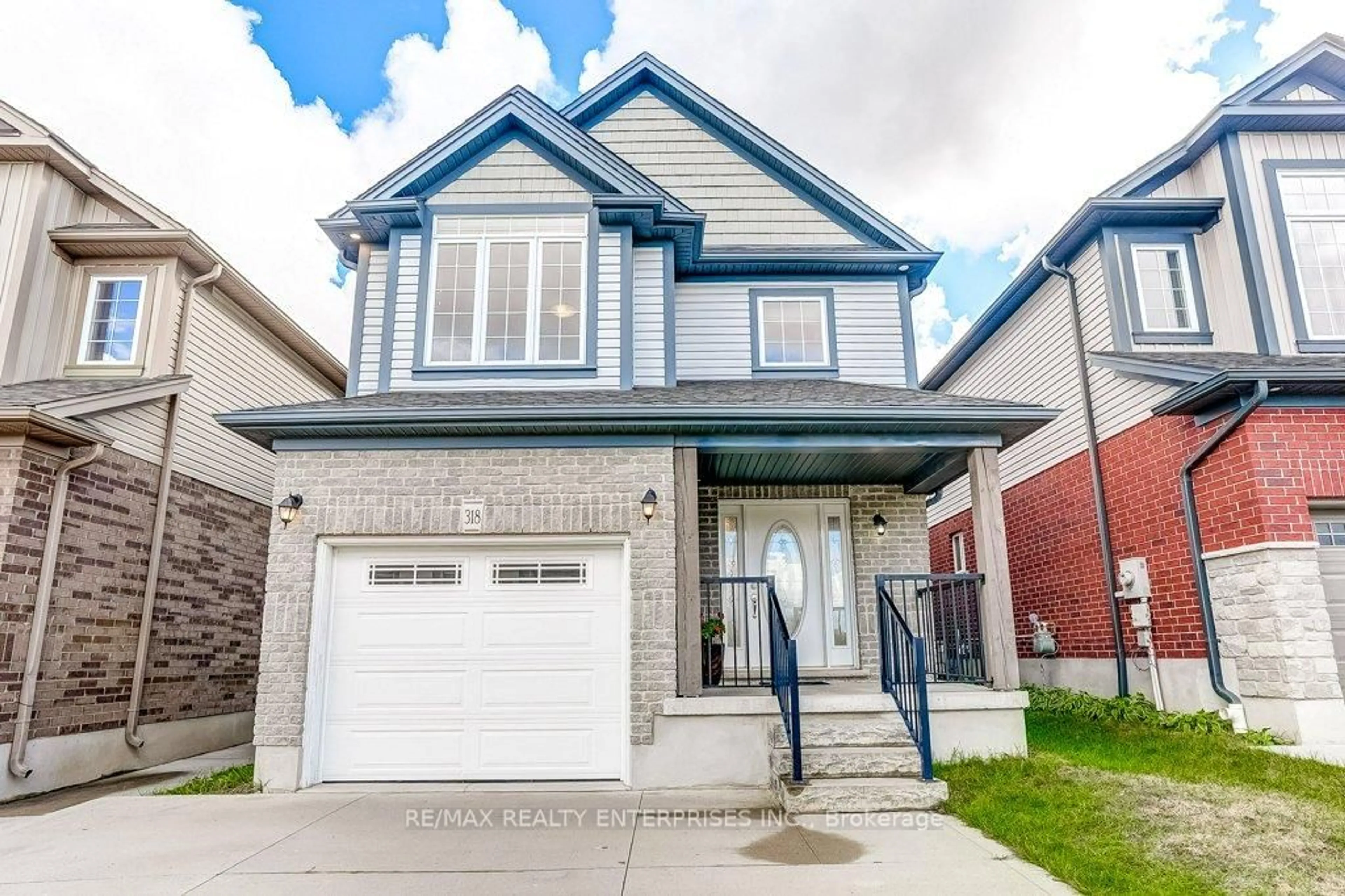 Home with brick exterior material, street for 318 Old Huron Rd, Kitchener Ontario N2R 1P8