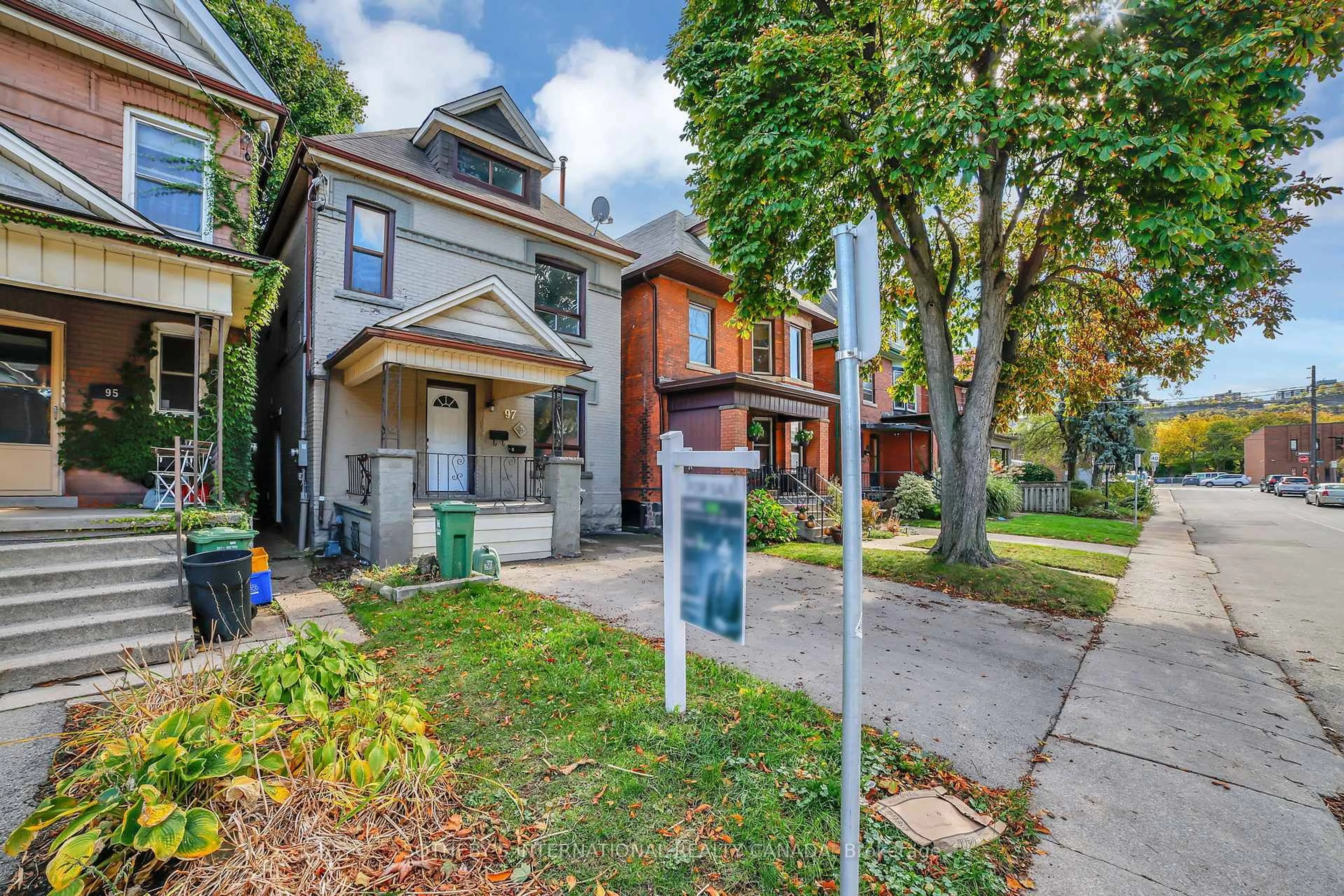 Home with brick exterior material, street for 97 Garfield Ave, Hamilton Ontario L8M 2S3