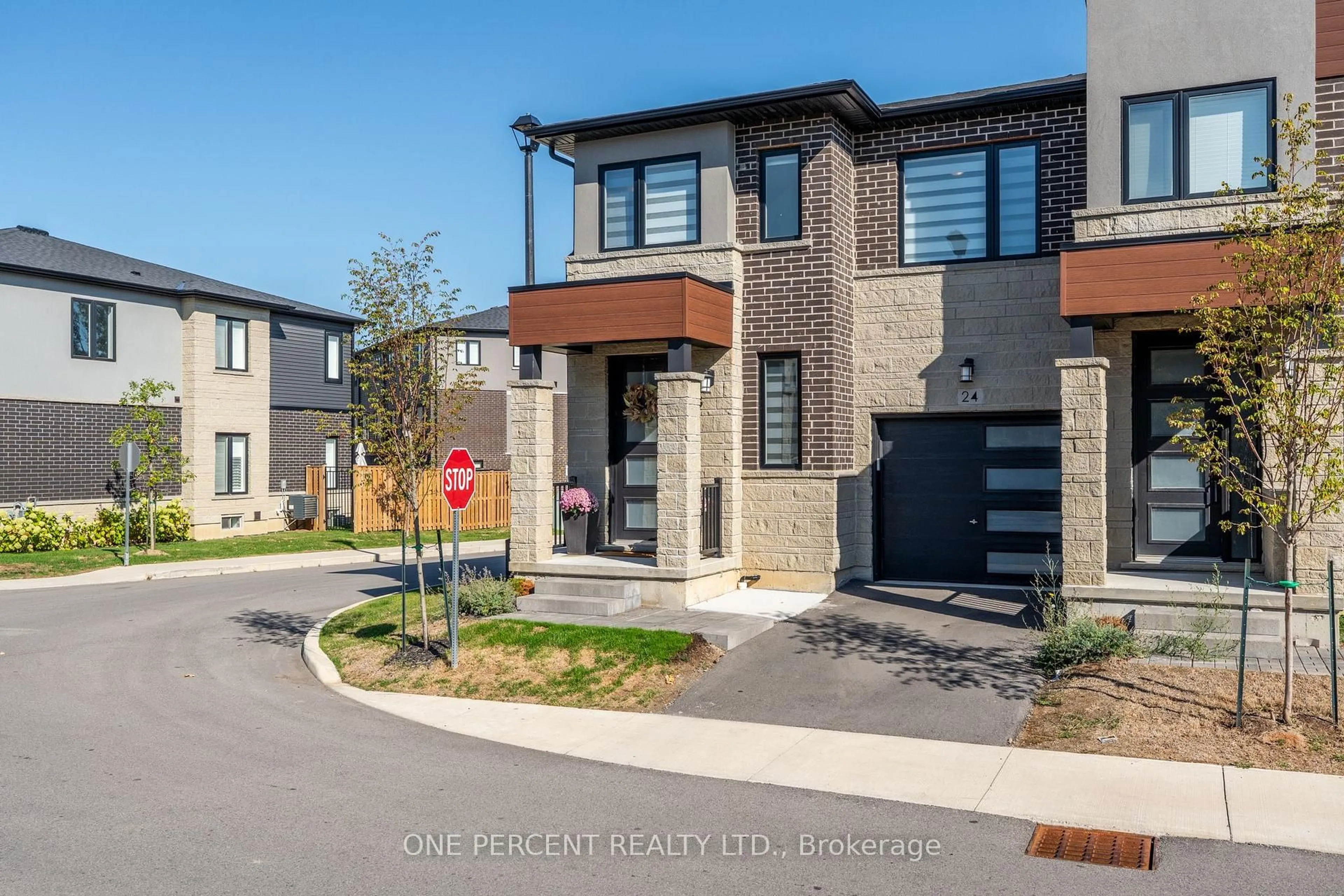 Home with brick exterior material, street for 24 Southam Lane, Hamilton Ontario L9C 0E9