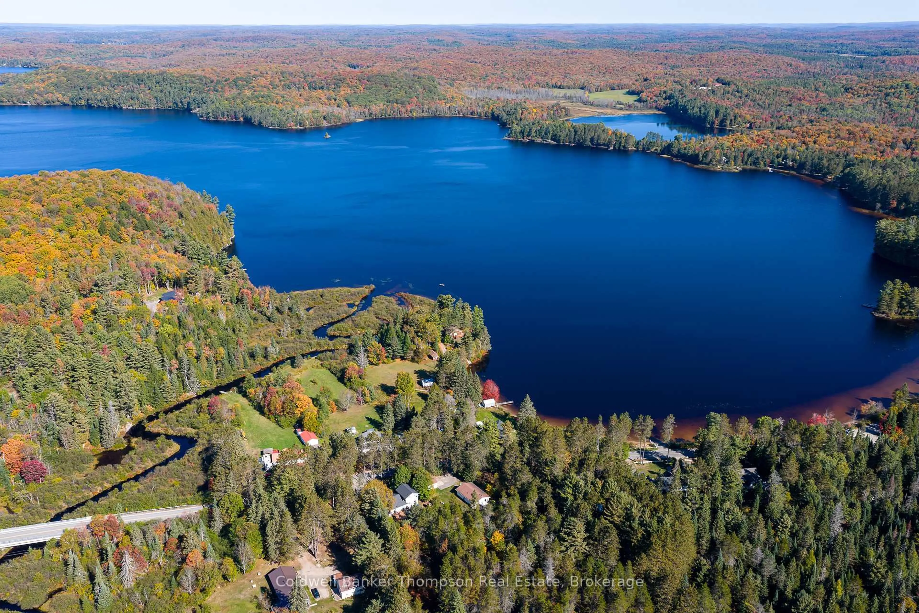 A pic from outside/outdoor area/front of a property/back of a property/a pic from drone, water/lake/river/ocean view for 4237 Ravenscliffe Rd, Huntsville Ontario P1H 2J2