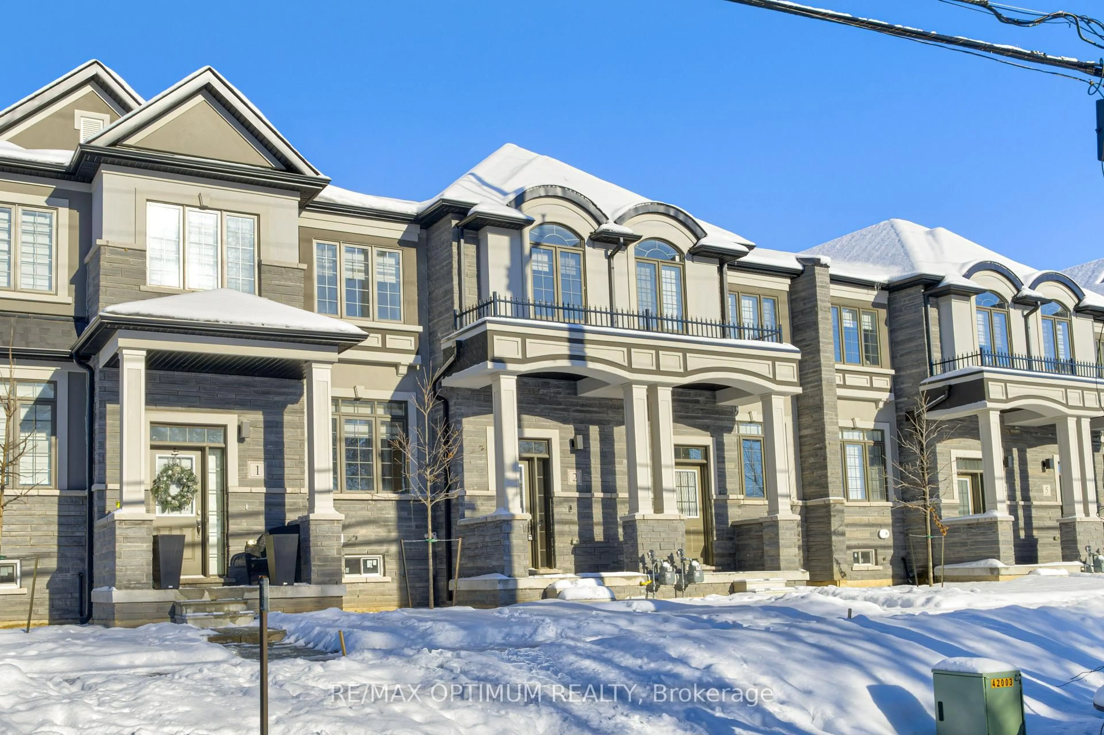 Home with brick exterior material, street for 305 Garner Rd #2, Hamilton Ontario L9G 3E6