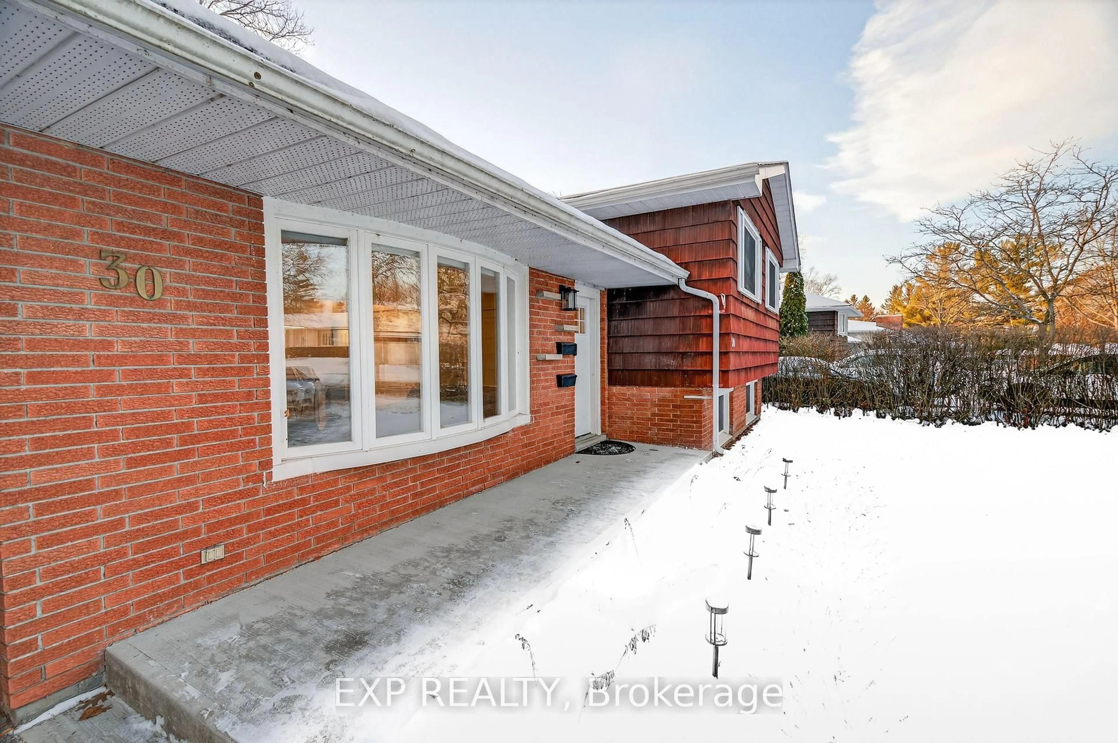 Home with brick exterior material, street for 30 Queen Mary Rd, Kingston Ontario K7M 2A4