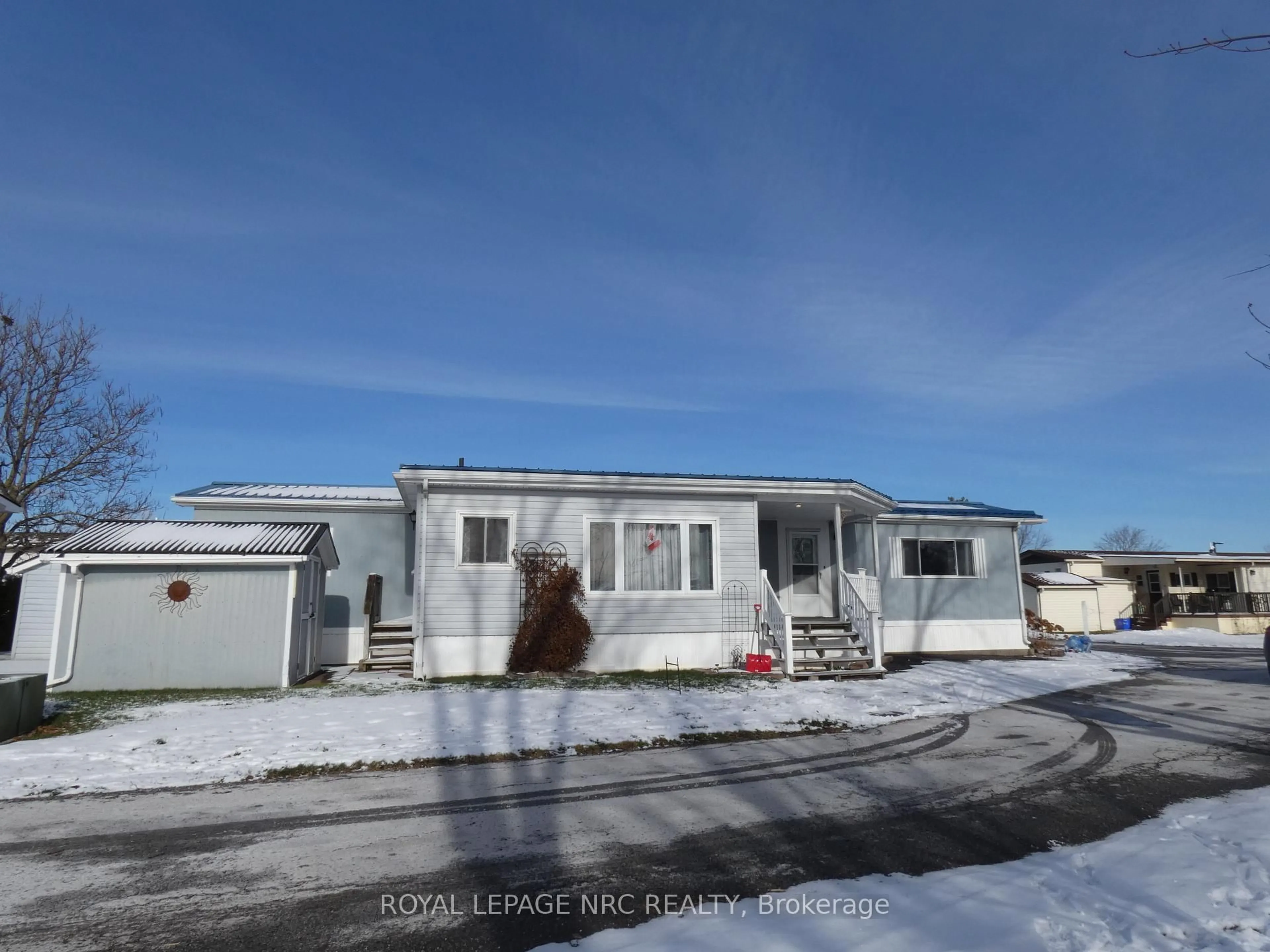 A pic from outside/outdoor area/front of a property/back of a property/a pic from drone, street for 3033 Townline Rd #121, Fort Erie Ontario L0S 1S1