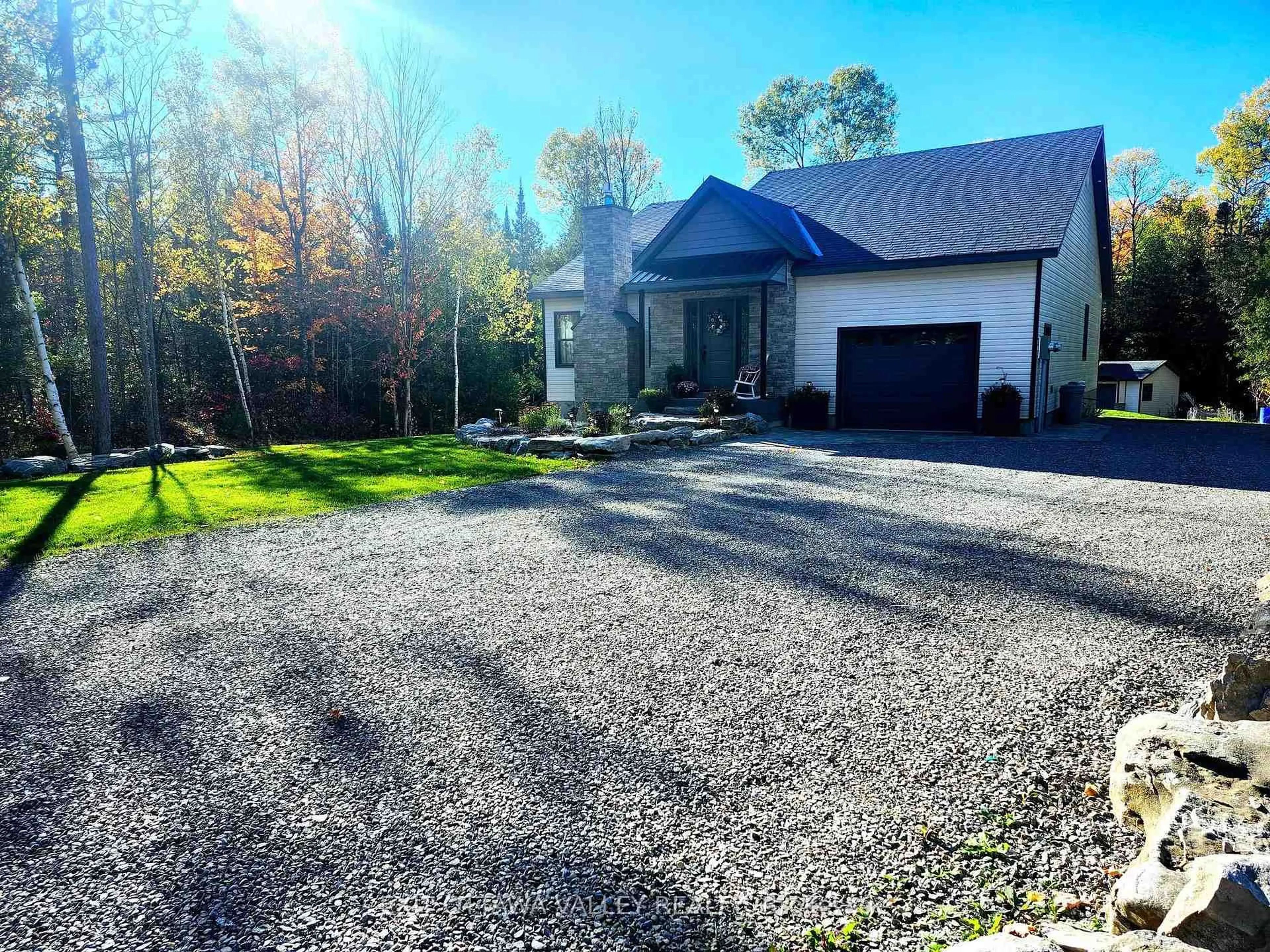 A pic from outside/outdoor area/front of a property/back of a property/a pic from drone, street for 1485 Rapid Rd, Westmeath Ontario K0J 2L0