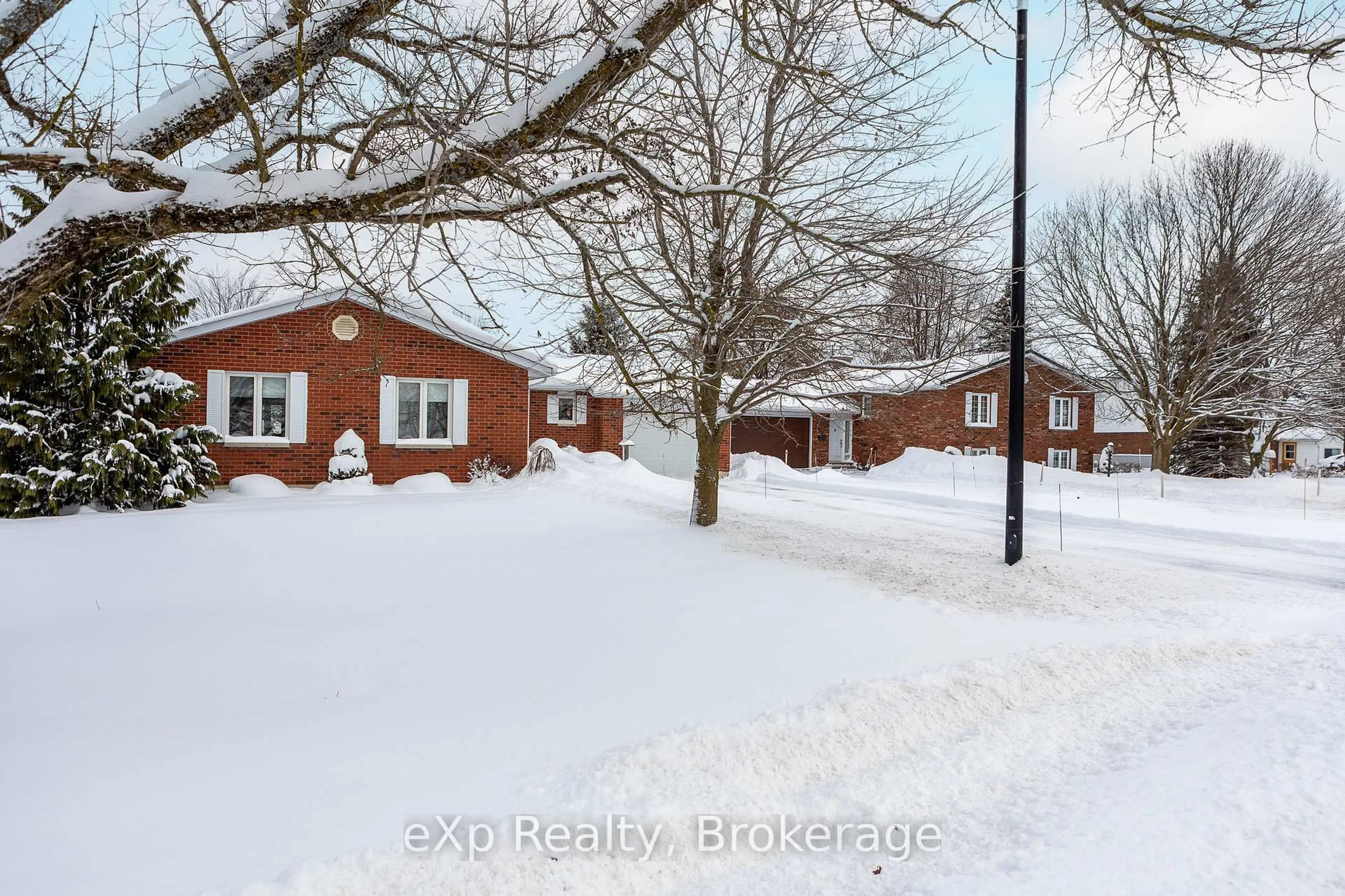 A pic from outside/outdoor area/front of a property/back of a property/a pic from drone, street for 103 Margaret Elizabeth Ave, Grey Highlands Ontario N0C 1H0