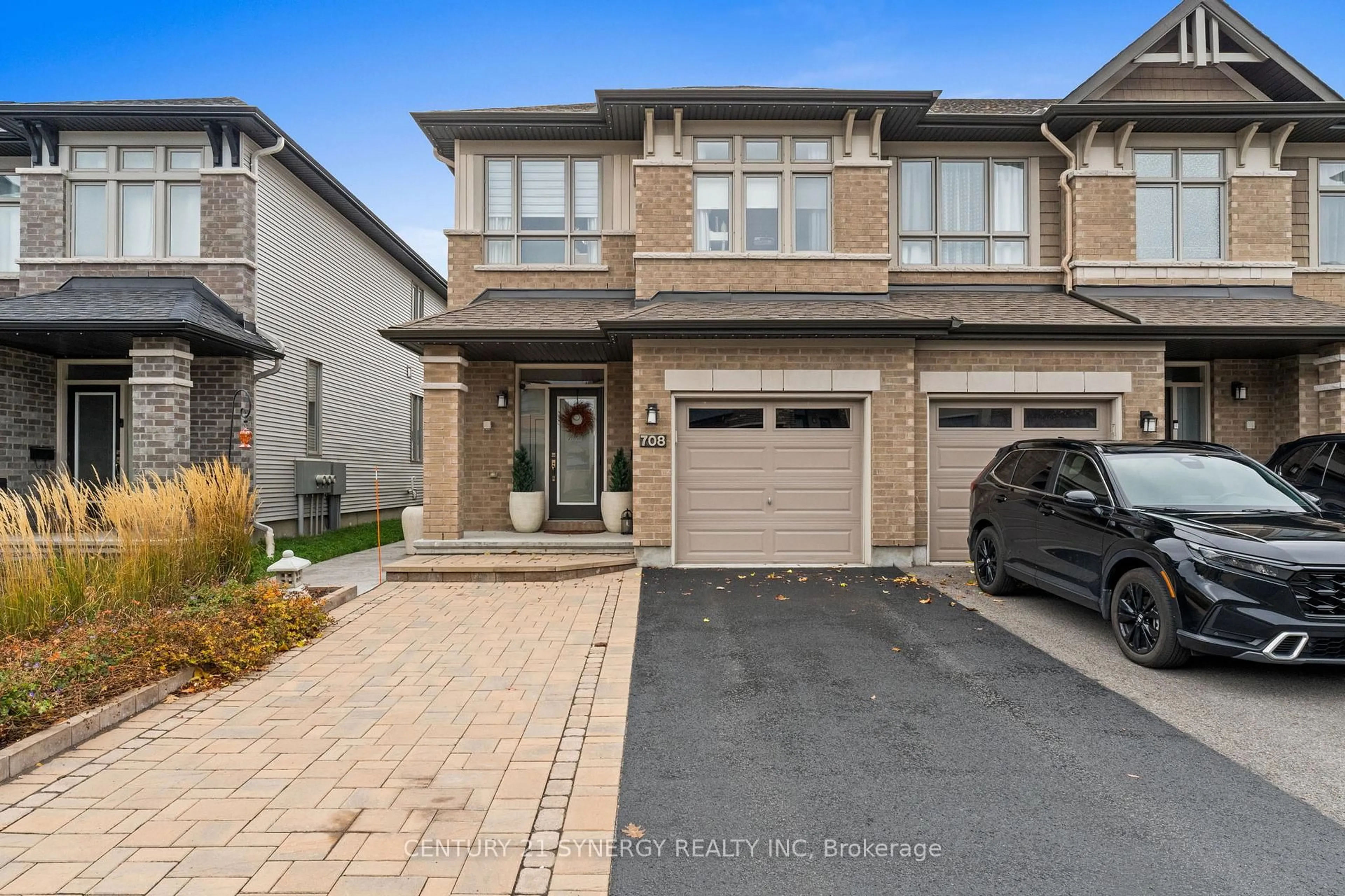 Home with brick exterior material, street for 708 Guardian Grve, Ottawa Ontario K1X 0B3