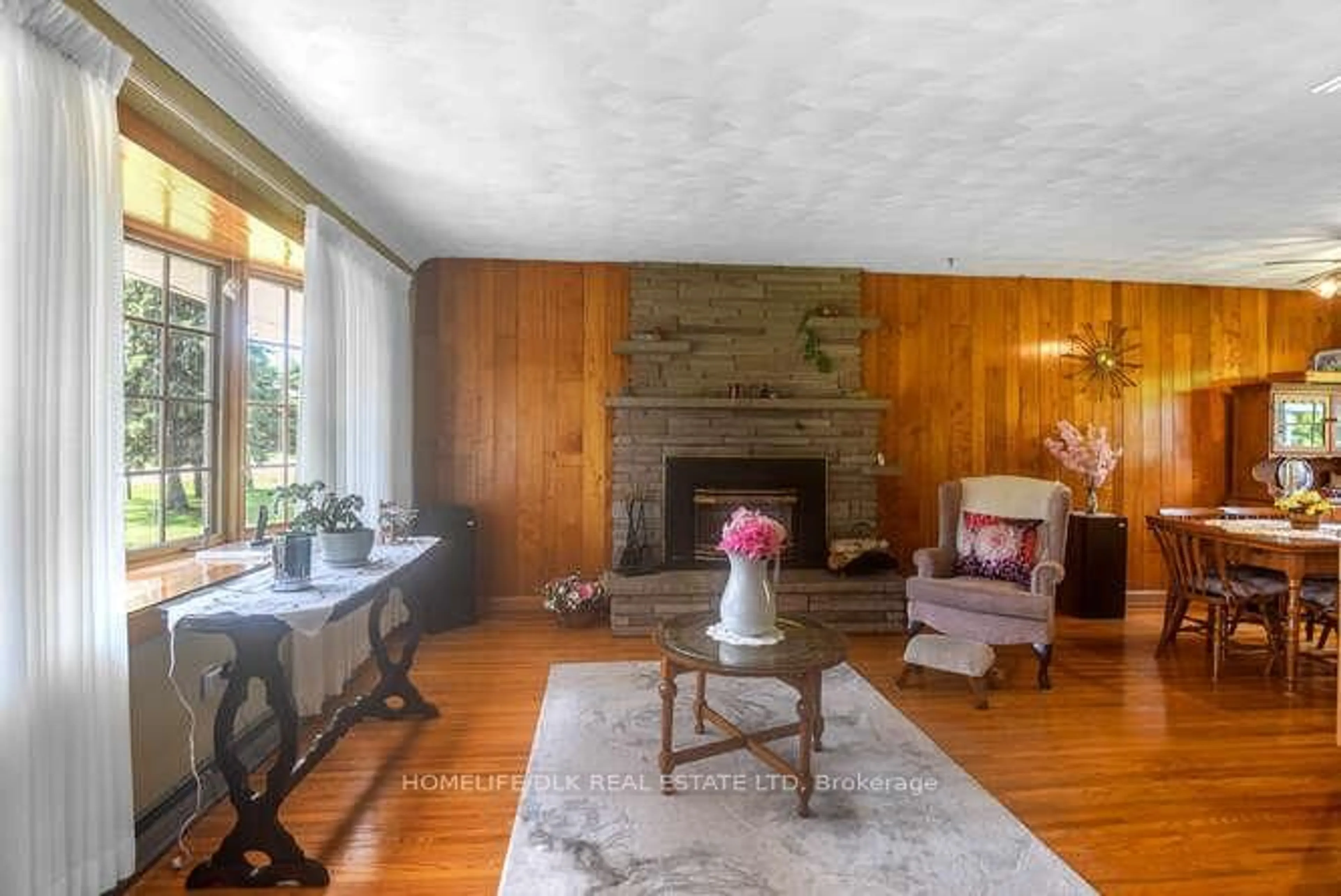 Living room with furniture, wood/laminate floor for 1190 County Rd 2 Rd, Elizabethtown-Kitley Ontario K6V 5T3