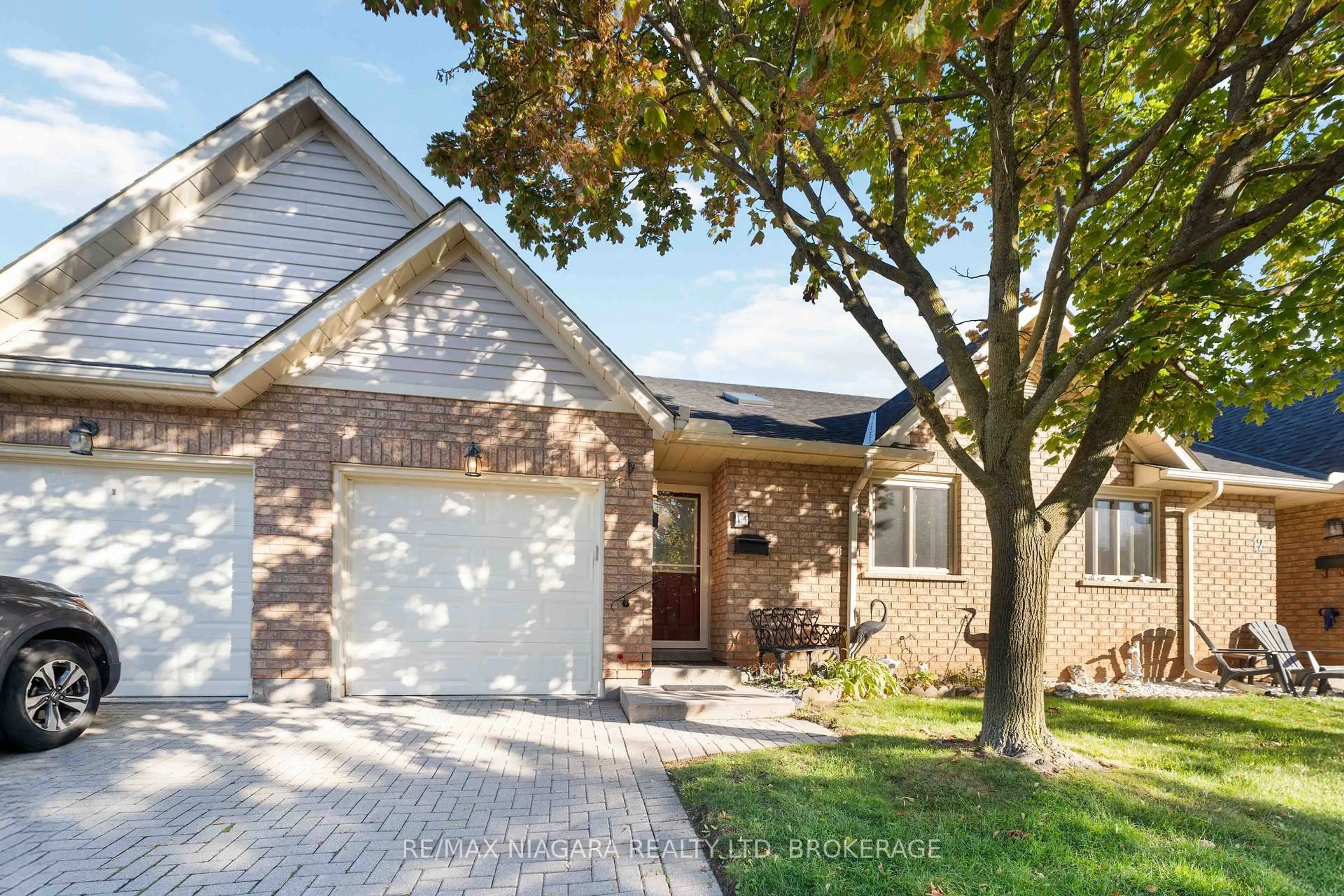 Home with brick exterior material, street for 165 Main St #14, Grimsby Ontario L3M 1P2