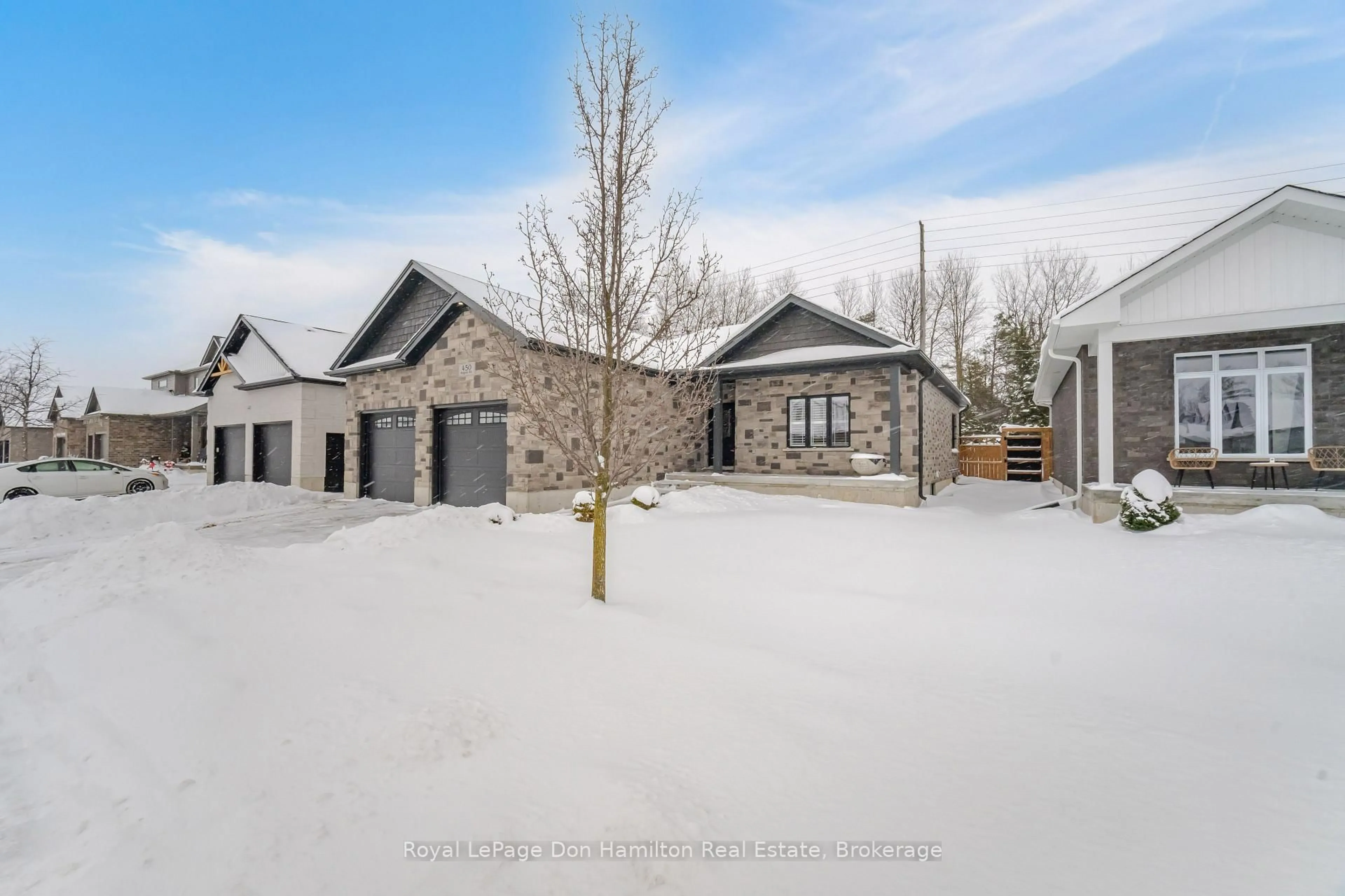 A pic from outside/outdoor area/front of a property/back of a property/a pic from drone, street for 450 Rogers Rd, North Perth Ontario N4W 1H2