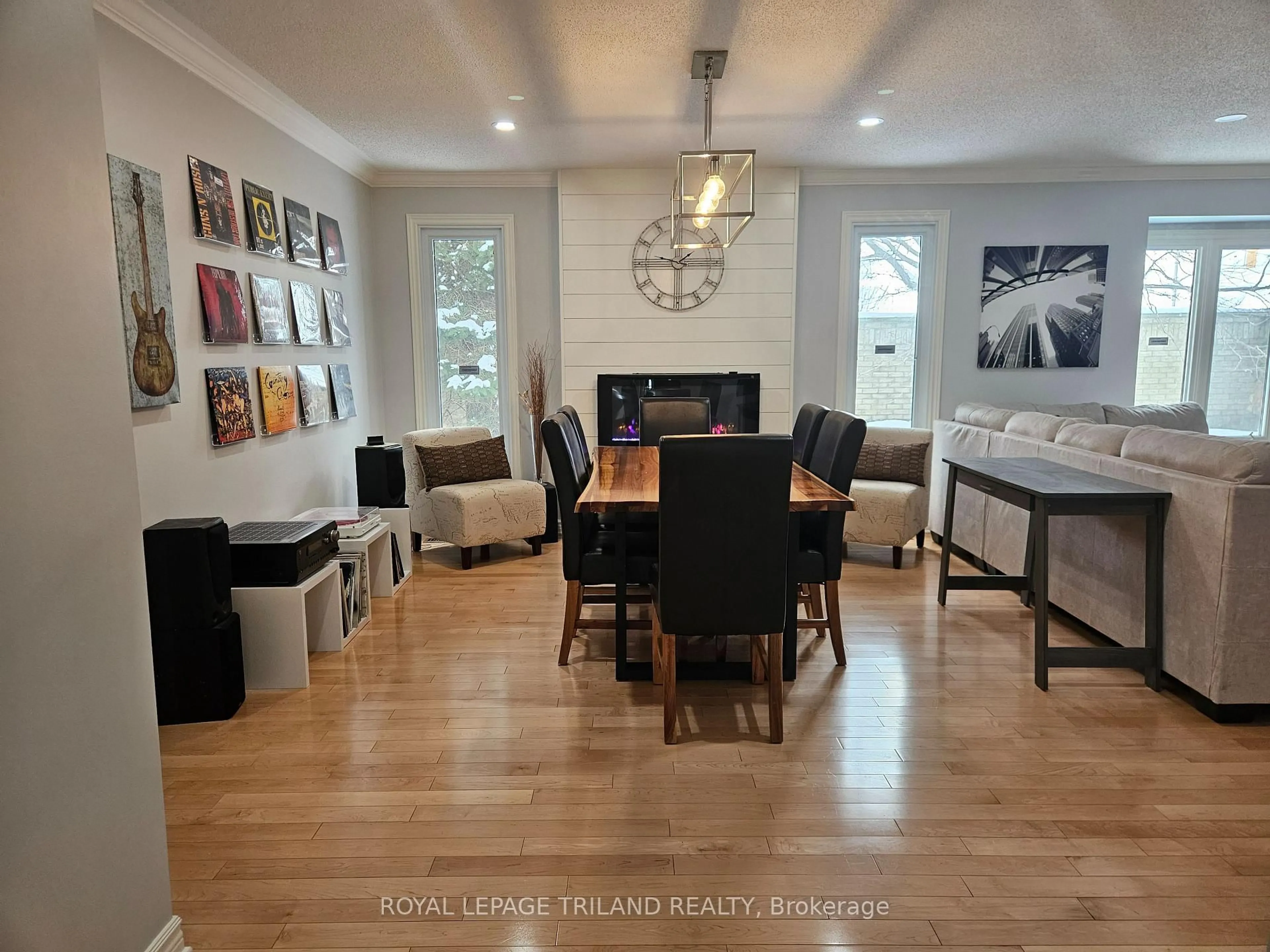 Living room with furniture, wood/laminate floor for 163 Pine Valley Dr #17, London South Ontario N6J 4R1