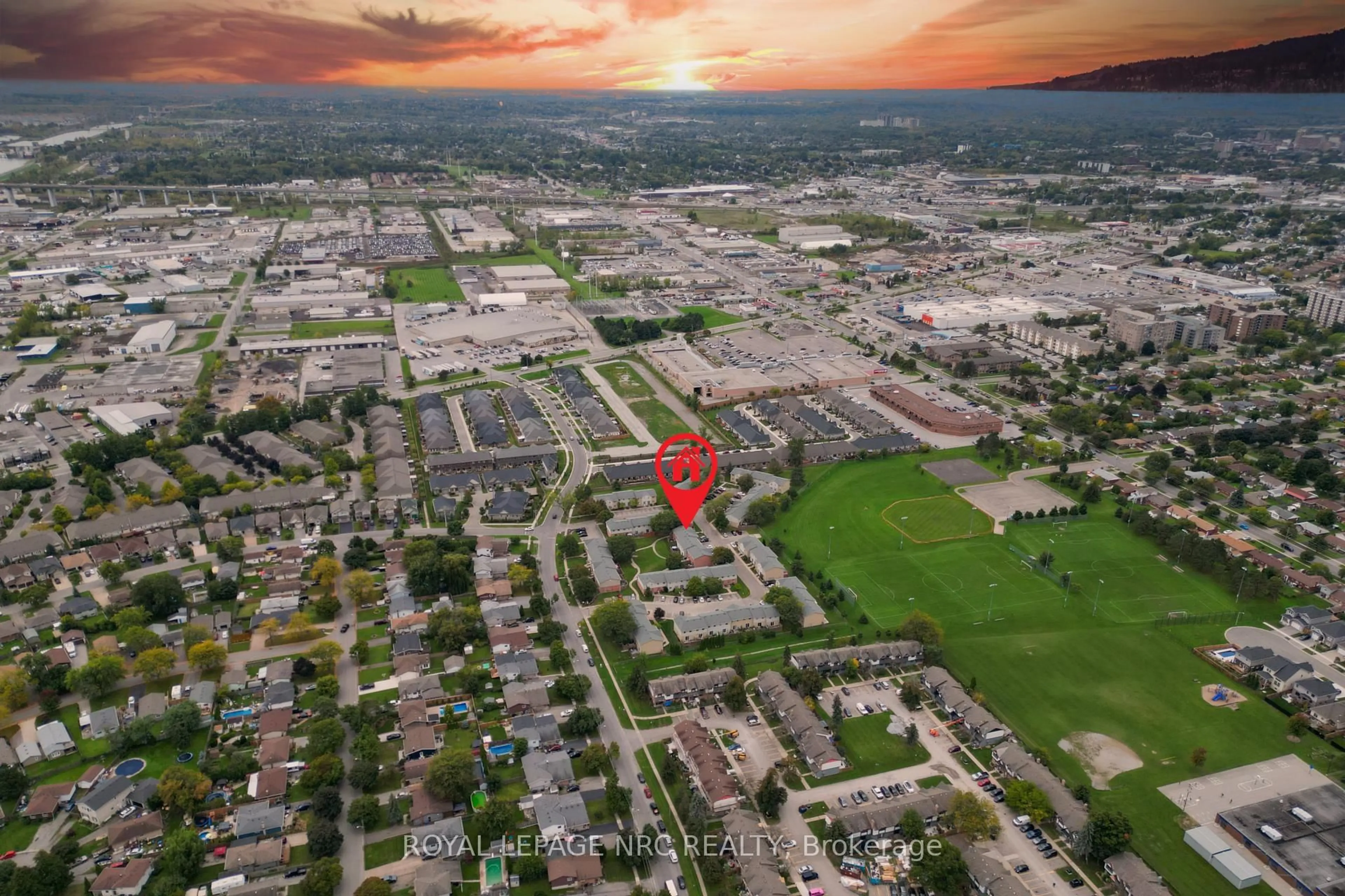 A pic from outside/outdoor area/front of a property/back of a property/a pic from drone, unknown for 65 Dorchester Blvd #70, St. Catharines Ontario L2M 7T7