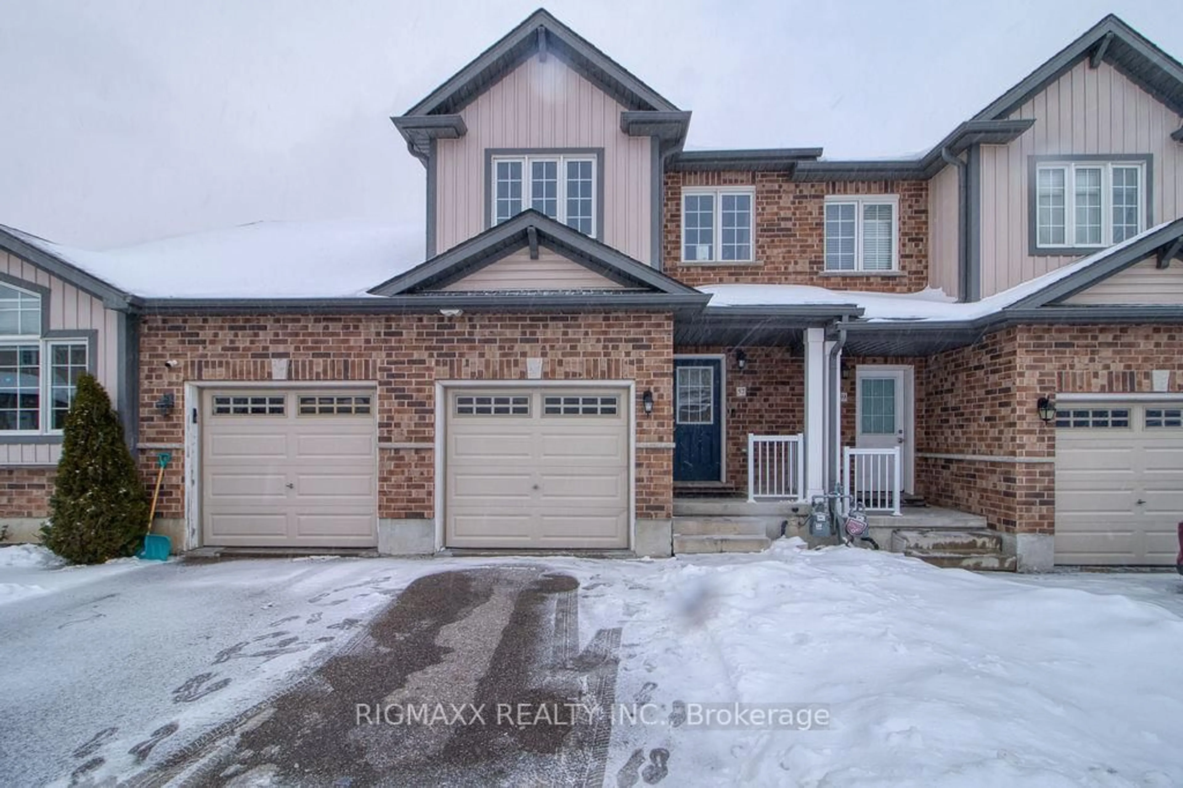 Home with brick exterior material, street for 57 Renfrew St, Kitchener Ontario N2R 0G5