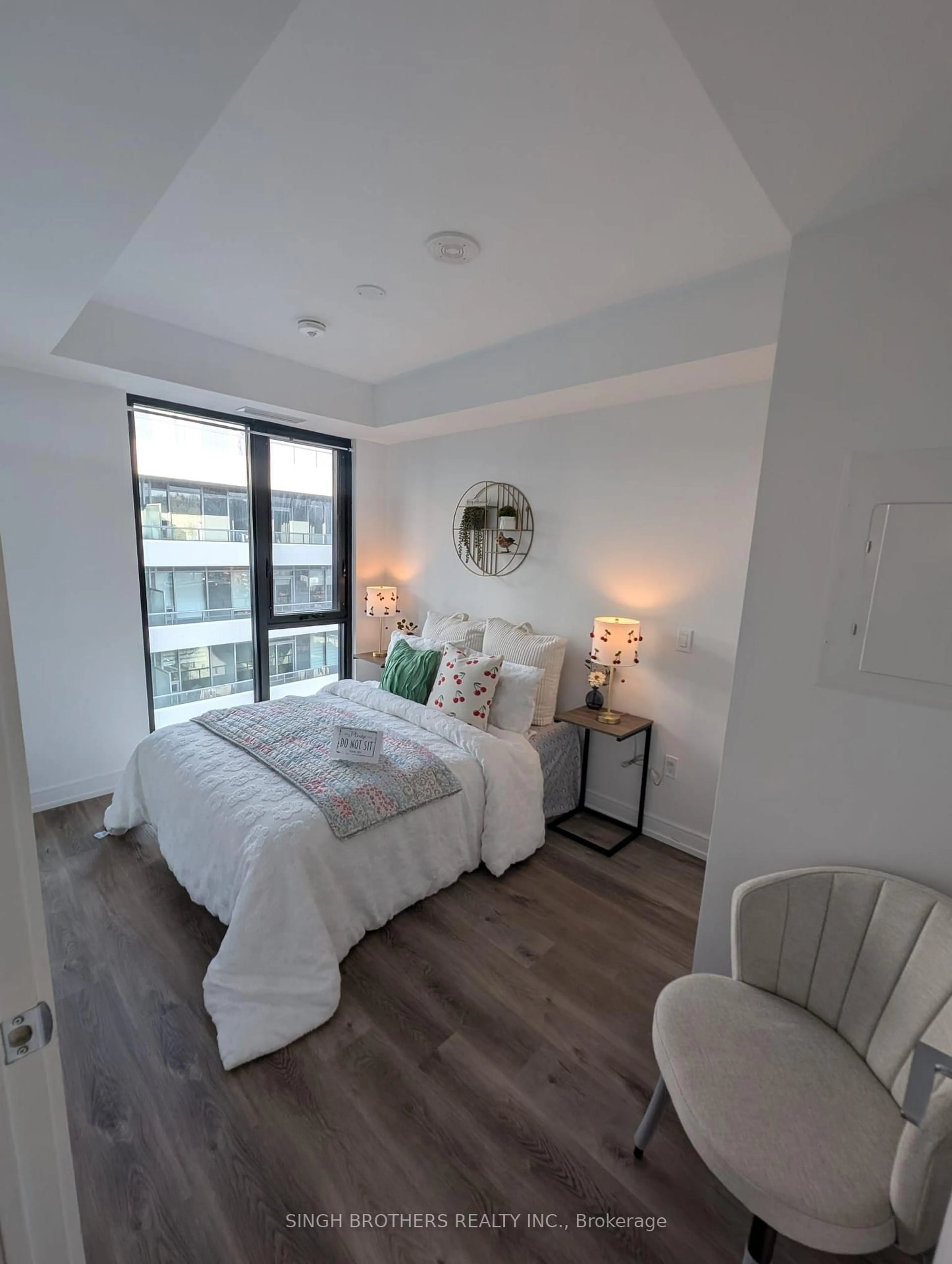 Bedroom with bed, wood/laminate floor for 1 Jarvis St #1319, Hamilton Ontario L8R 3J2