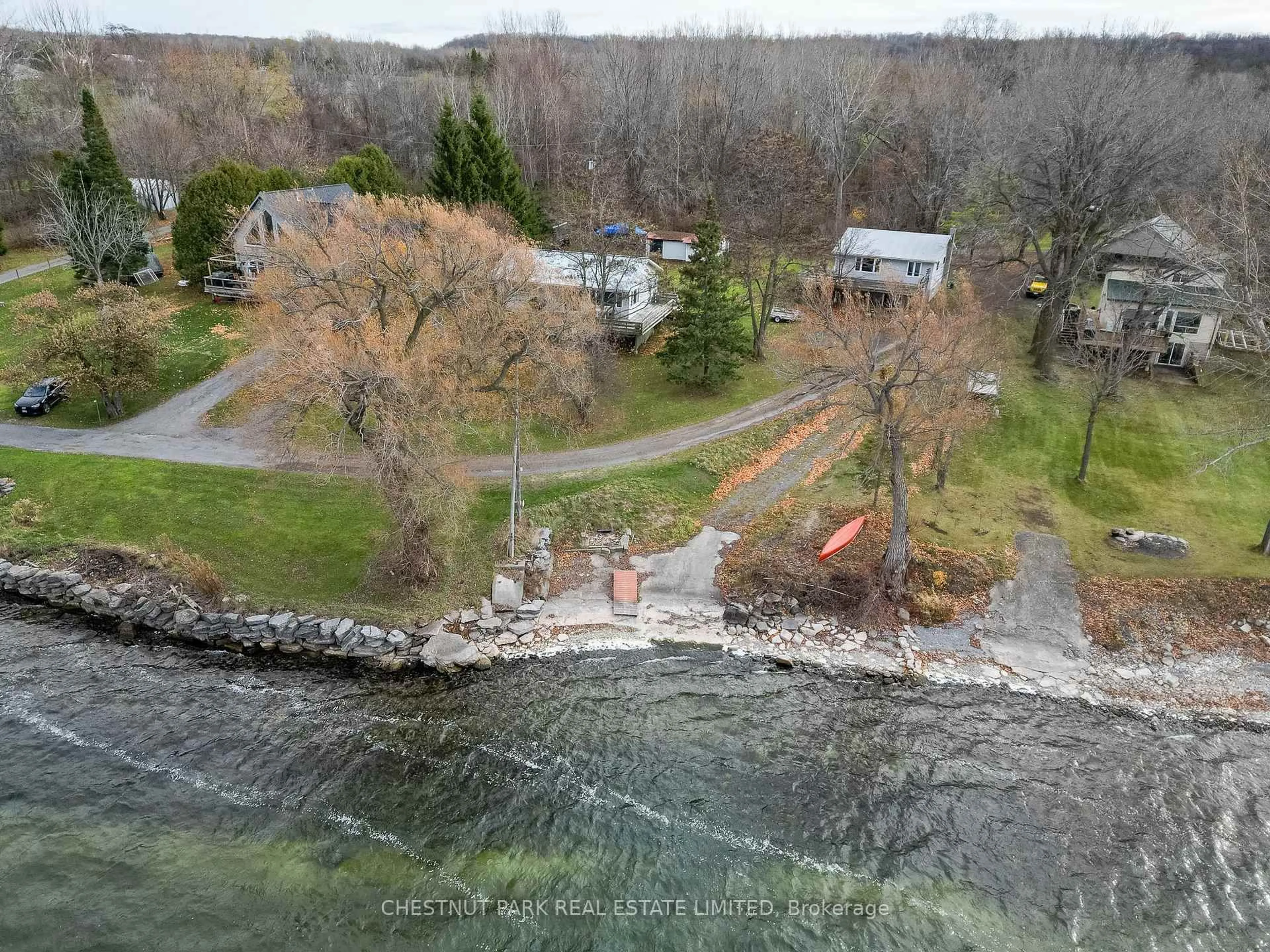 A pic from outside/outdoor area/front of a property/back of a property/a pic from drone, water/lake/river/ocean view for 84-88 Munroe Lane, Prince Edward County Ontario K0K 2T0