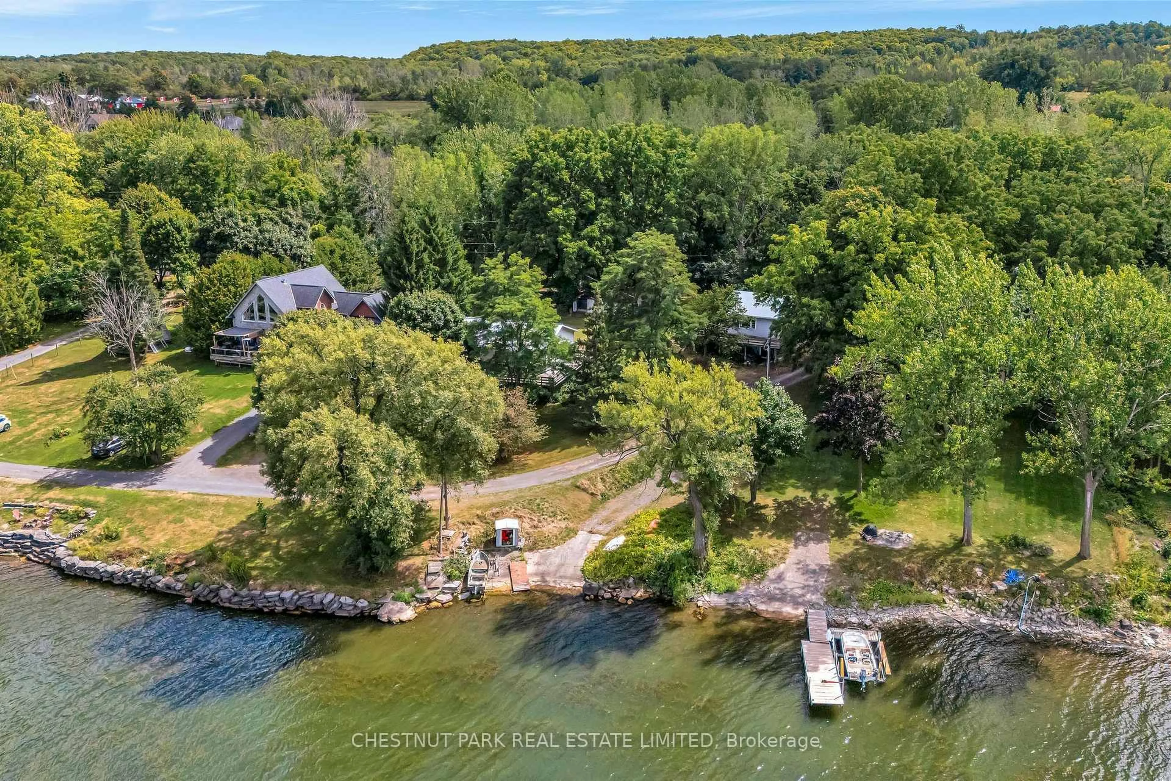 A pic from outside/outdoor area/front of a property/back of a property/a pic from drone, water/lake/river/ocean view for 84-88 Munroe Lane, Prince Edward County Ontario K0K 2T0