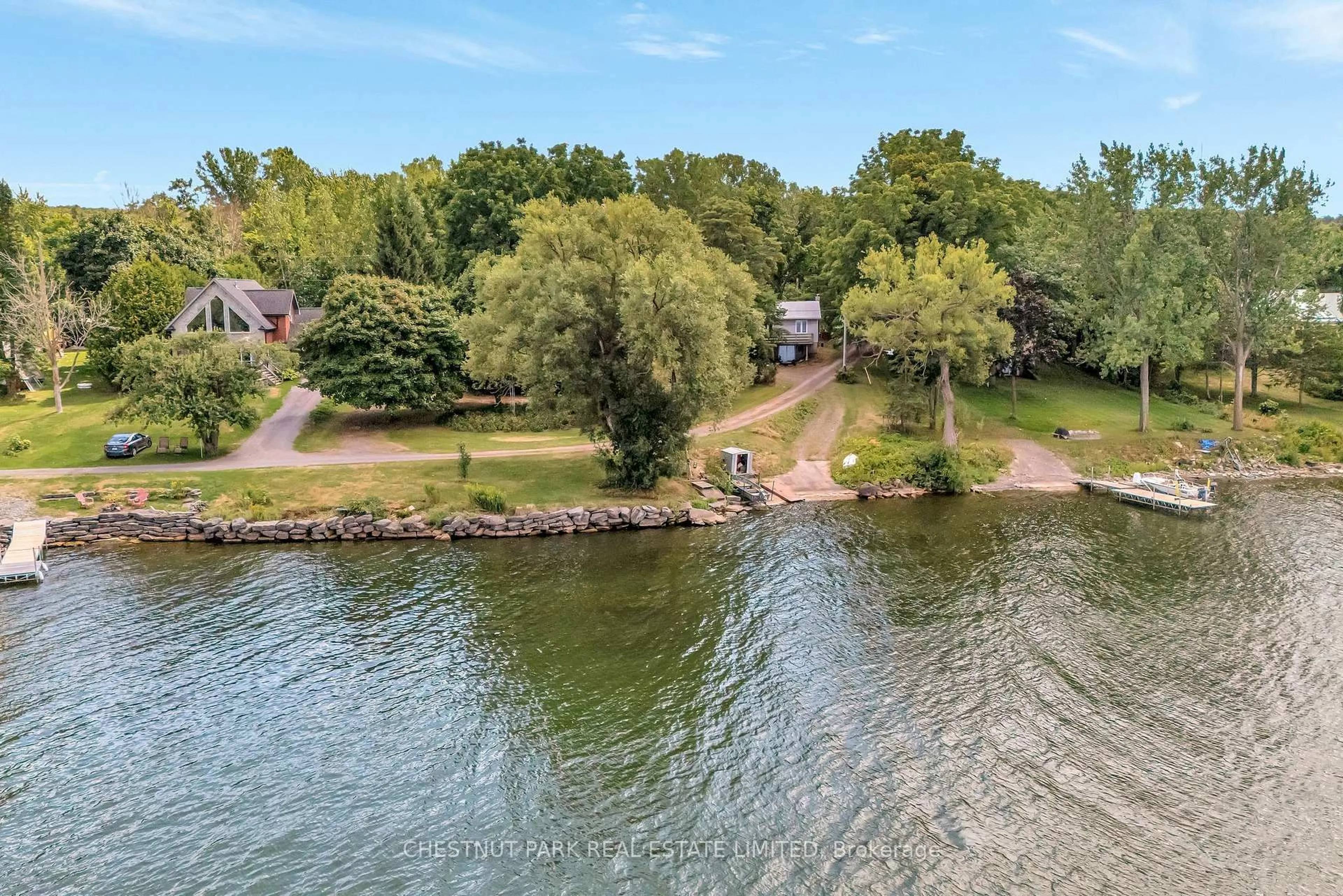 A pic from outside/outdoor area/front of a property/back of a property/a pic from drone, water/lake/river/ocean view for 84-88 Munroe Lane, Prince Edward County Ontario K0K 2T0