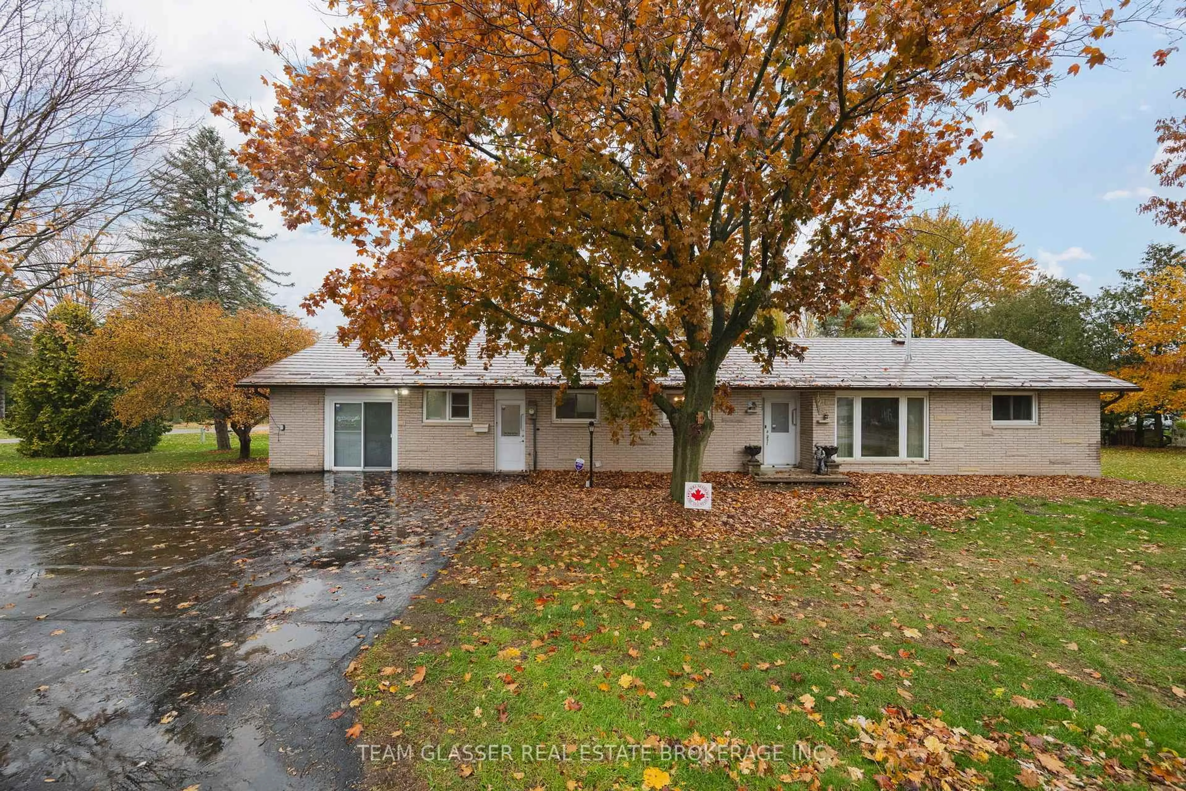 A pic from outside/outdoor area/front of a property/back of a property/a pic from drone, street for 128 Centre St, North Middlesex Ontario N0M 2K0