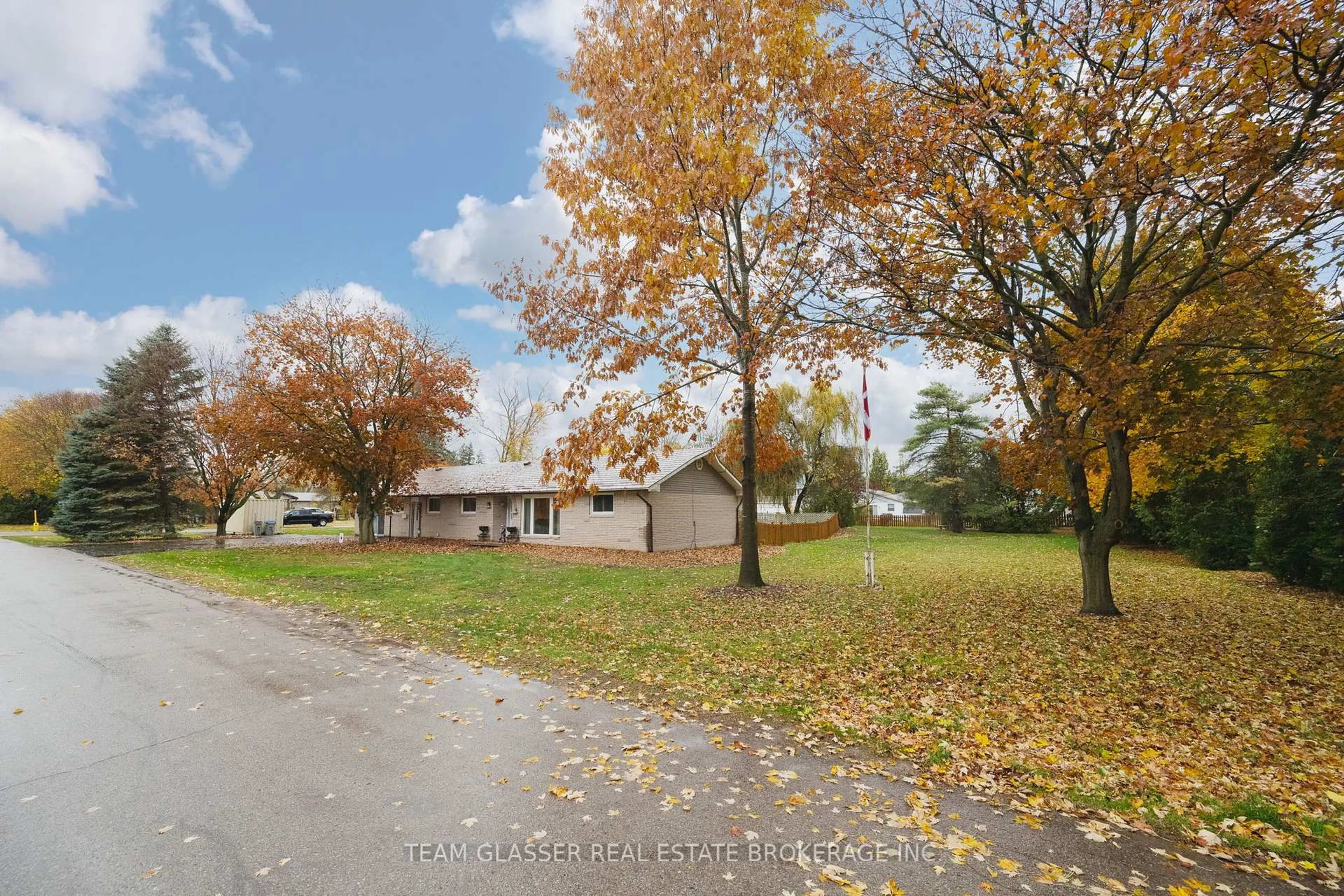 A pic from outside/outdoor area/front of a property/back of a property/a pic from drone, street for 128 Centre St, North Middlesex Ontario N0M 2K0