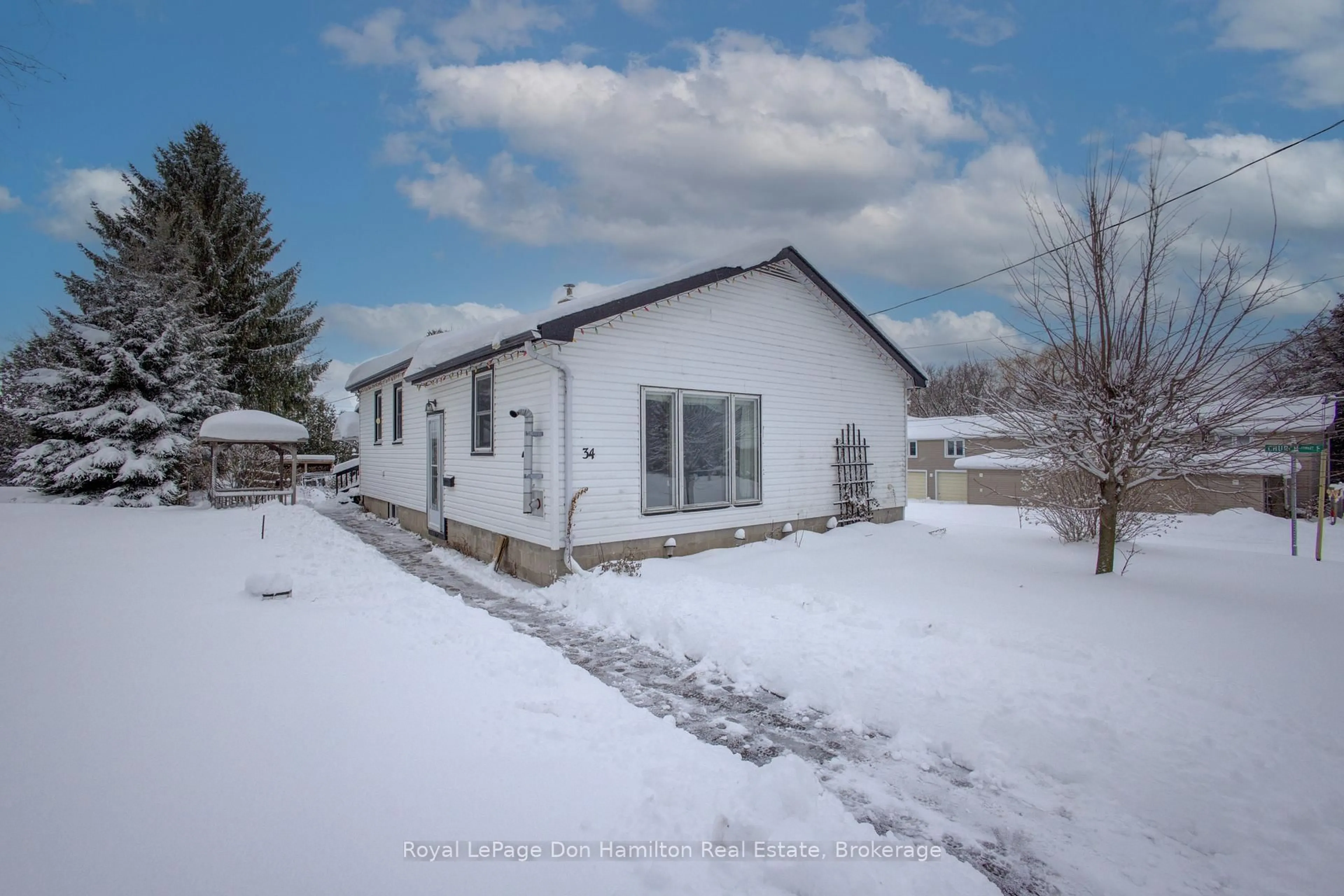 A pic from outside/outdoor area/front of a property/back of a property/a pic from drone, street for 34 George St, West Grey Ontario N0G 1S0
