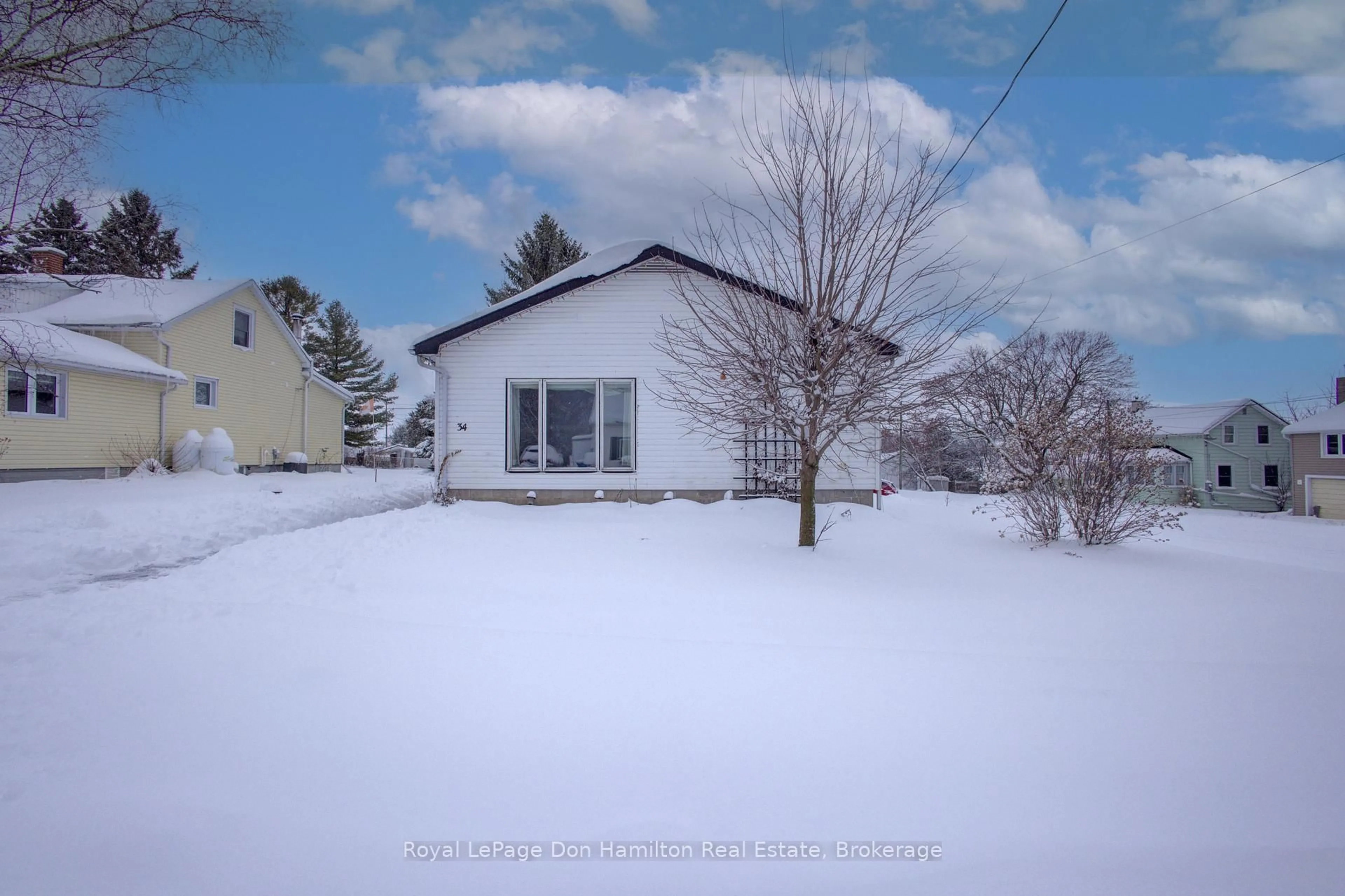 A pic from outside/outdoor area/front of a property/back of a property/a pic from drone, street for 34 George St, West Grey Ontario N0G 1S0