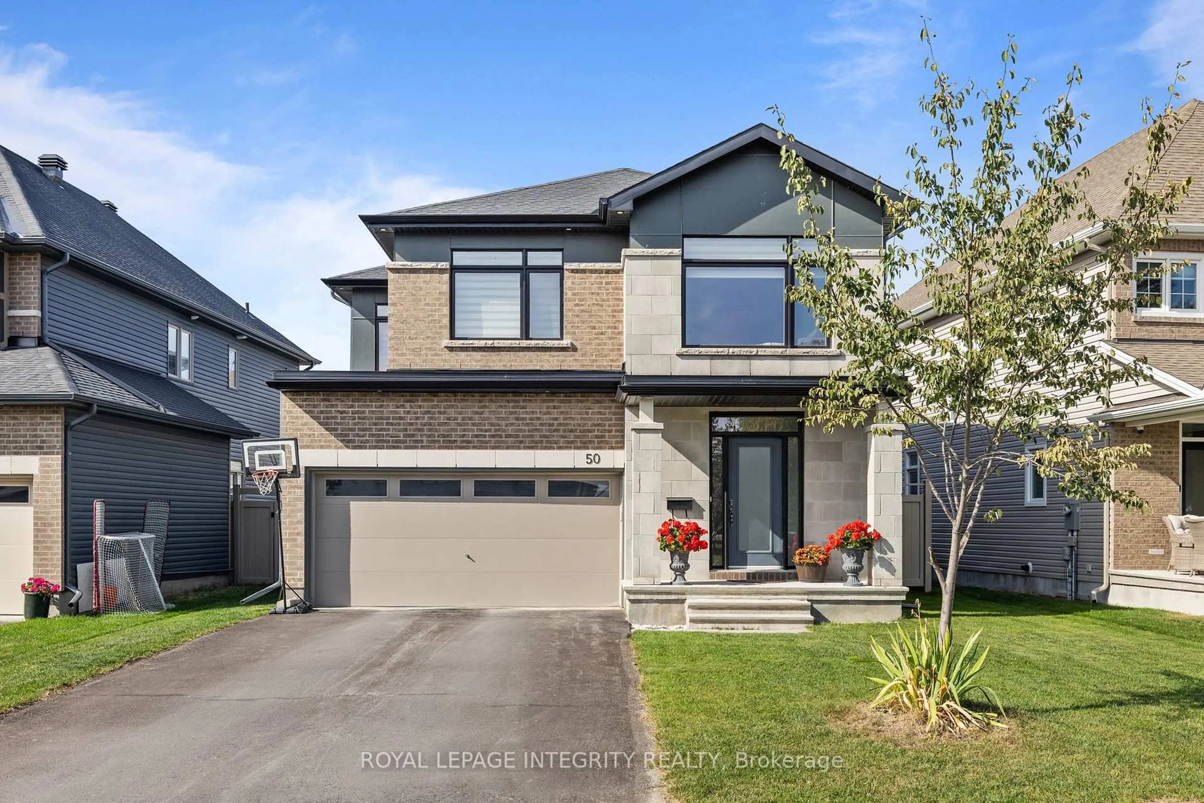 Home with brick exterior material, street for 50 Angel Hts, Stittsville Ontario K2S 2N4