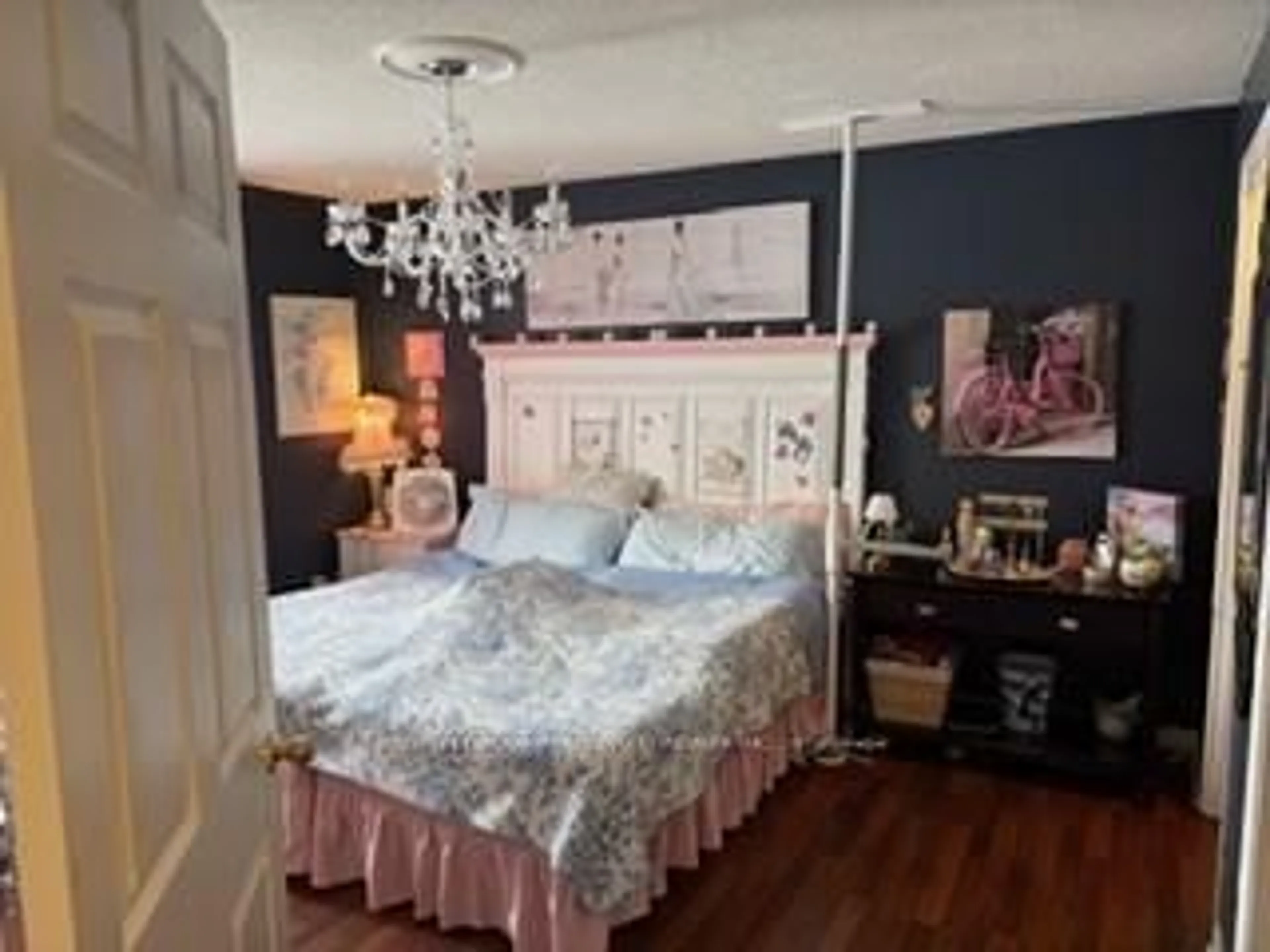 Bedroom with bed, wood/laminate floor for 11 Stewart St #1, Strathroy-Caradoc Ontario N7G 1A1