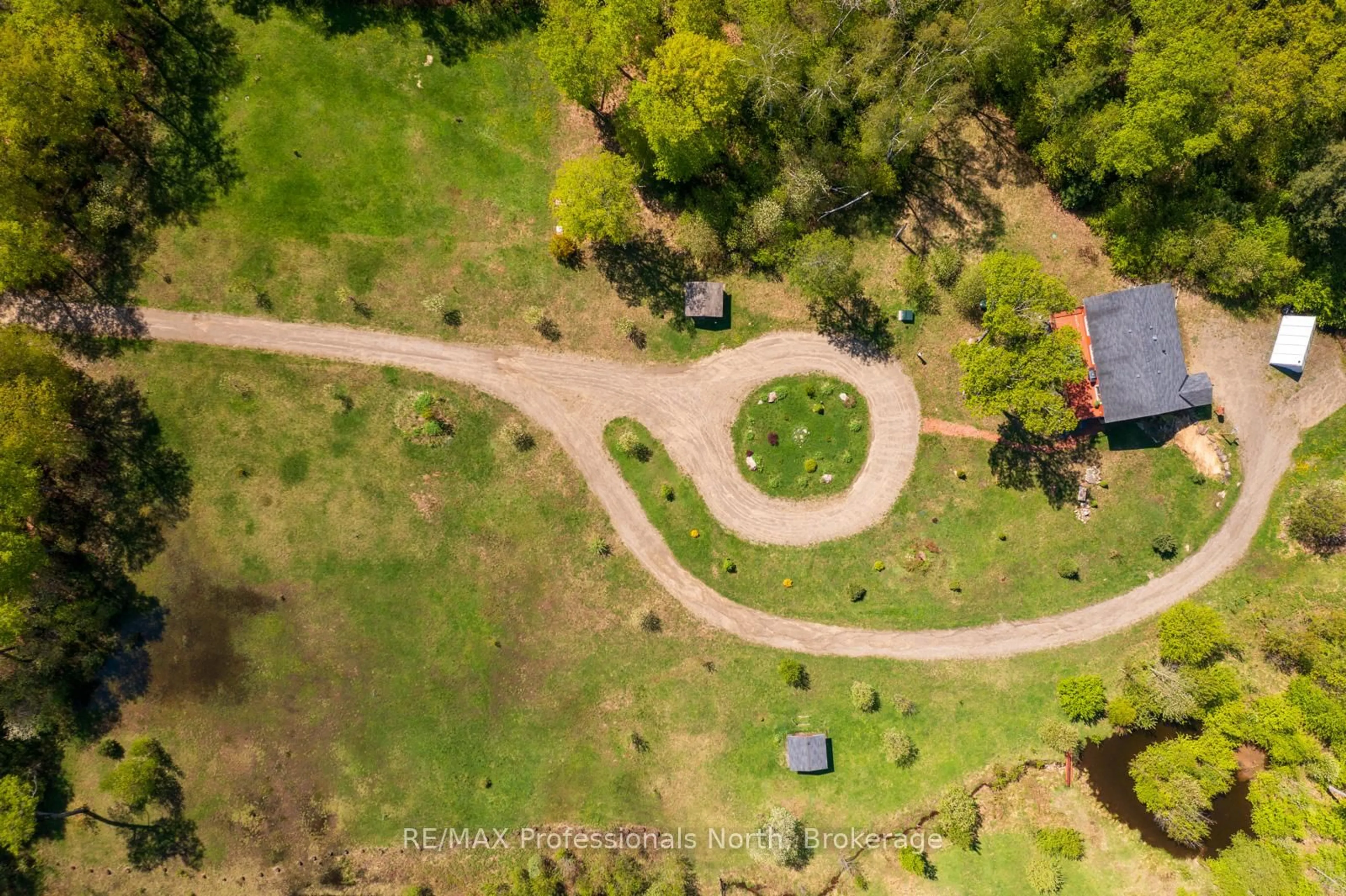 A pic from outside/outdoor area/front of a property/back of a property/a pic from drone, forest/trees view for 4043 Highway 60, Algonquin Highlands Ontario P0A 1H0