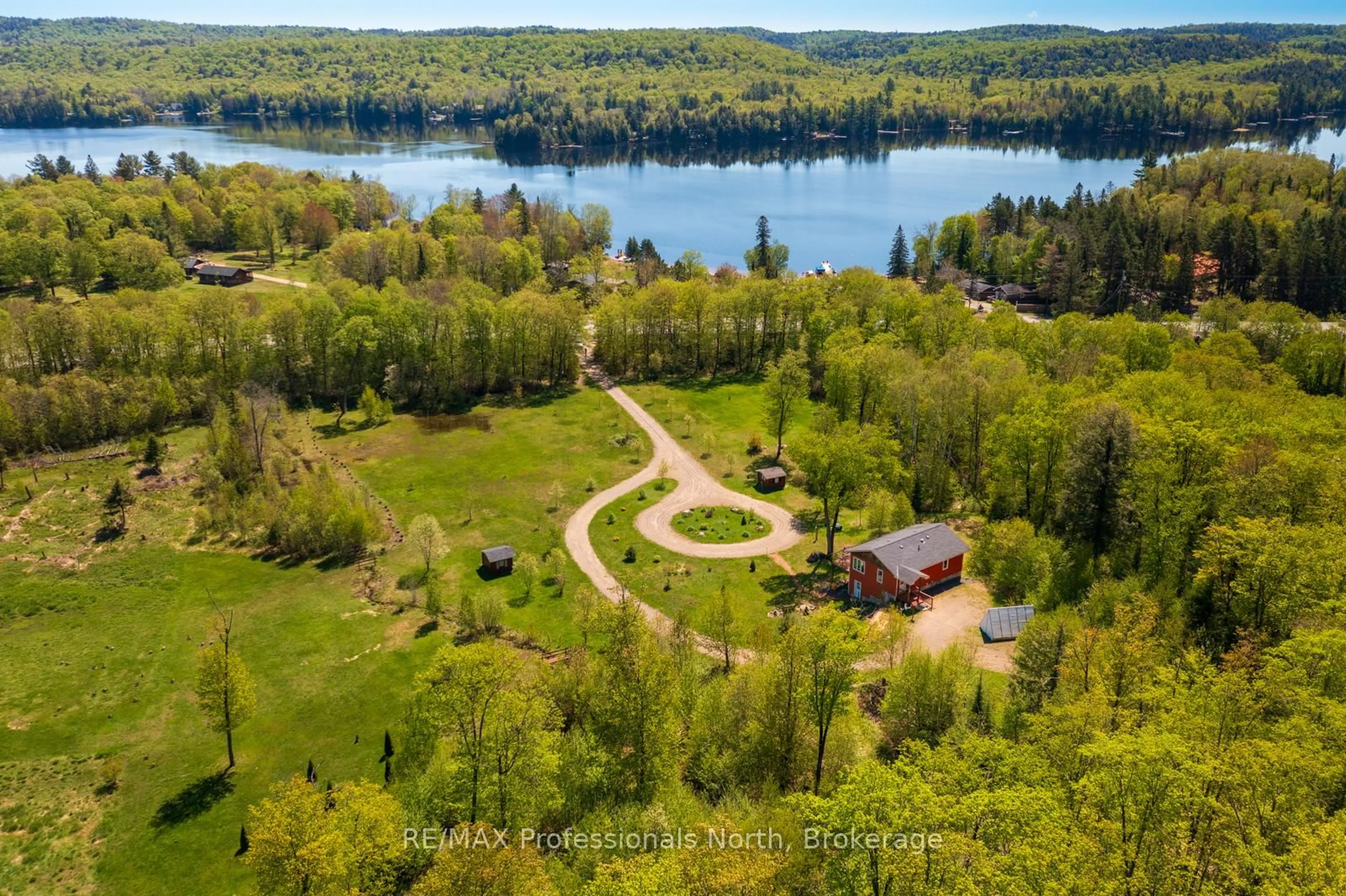 A pic from outside/outdoor area/front of a property/back of a property/a pic from drone, water/lake/river/ocean view for 4043 Highway 60, Algonquin Highlands Ontario P0A 1H0