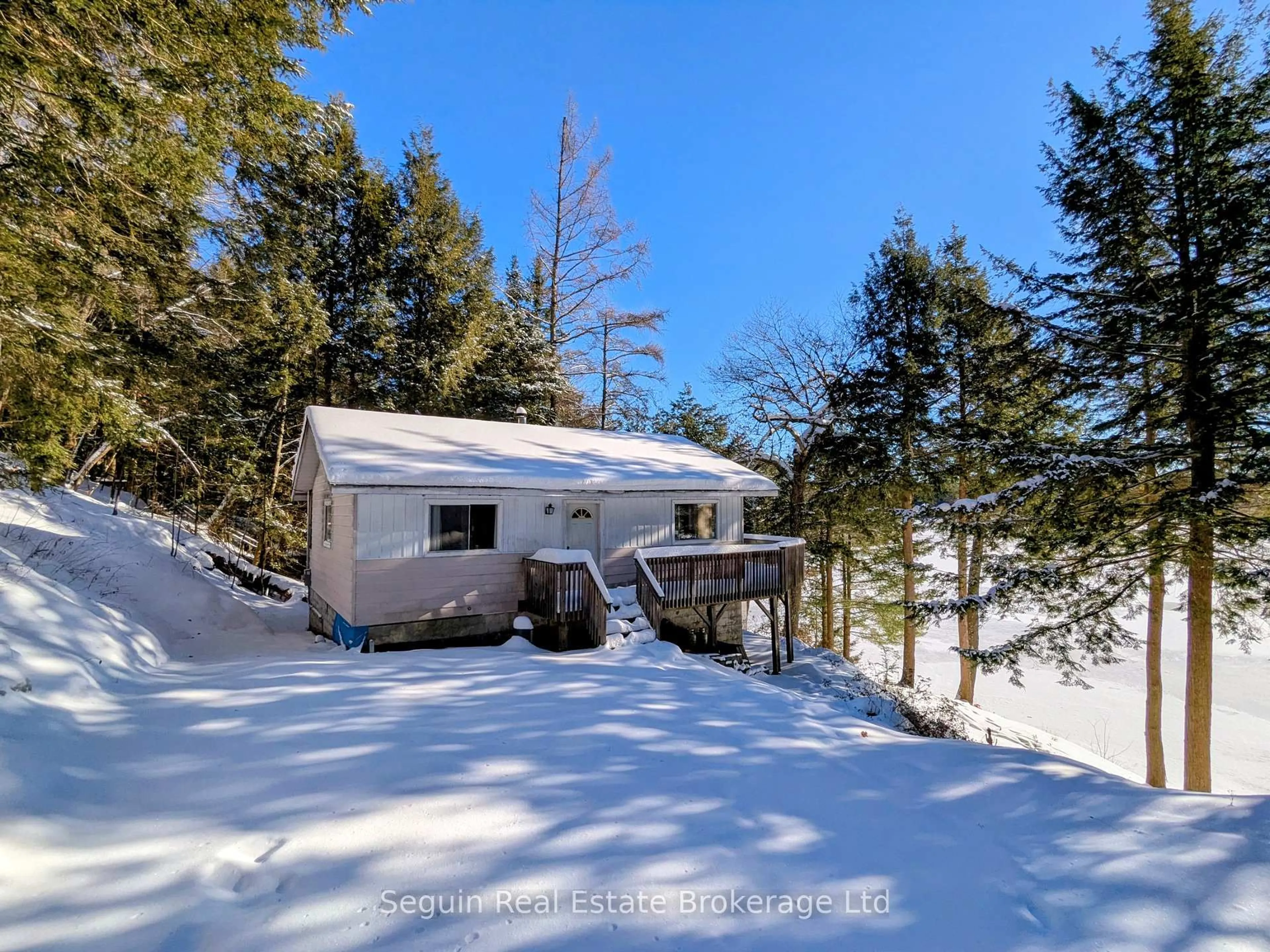 A pic from outside/outdoor area/front of a property/back of a property/a pic from drone, forest/trees view for 24 South Fork Rd, The Archipelago Ontario P2A 0B7