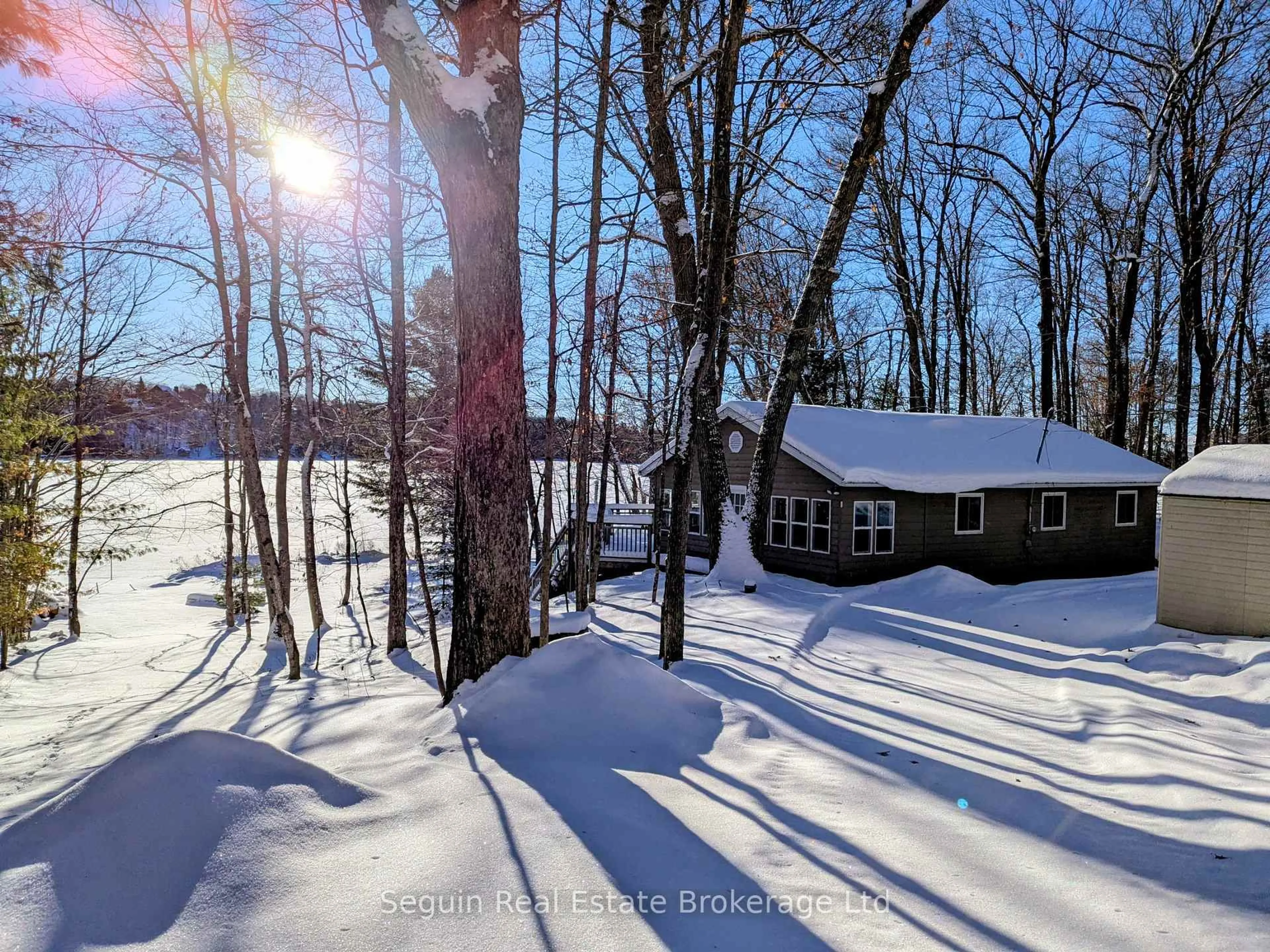A pic from outside/outdoor area/front of a property/back of a property/a pic from drone, forest/trees view for 151 Sugar Lake Rd, Seguin Ontario P2A 0B6