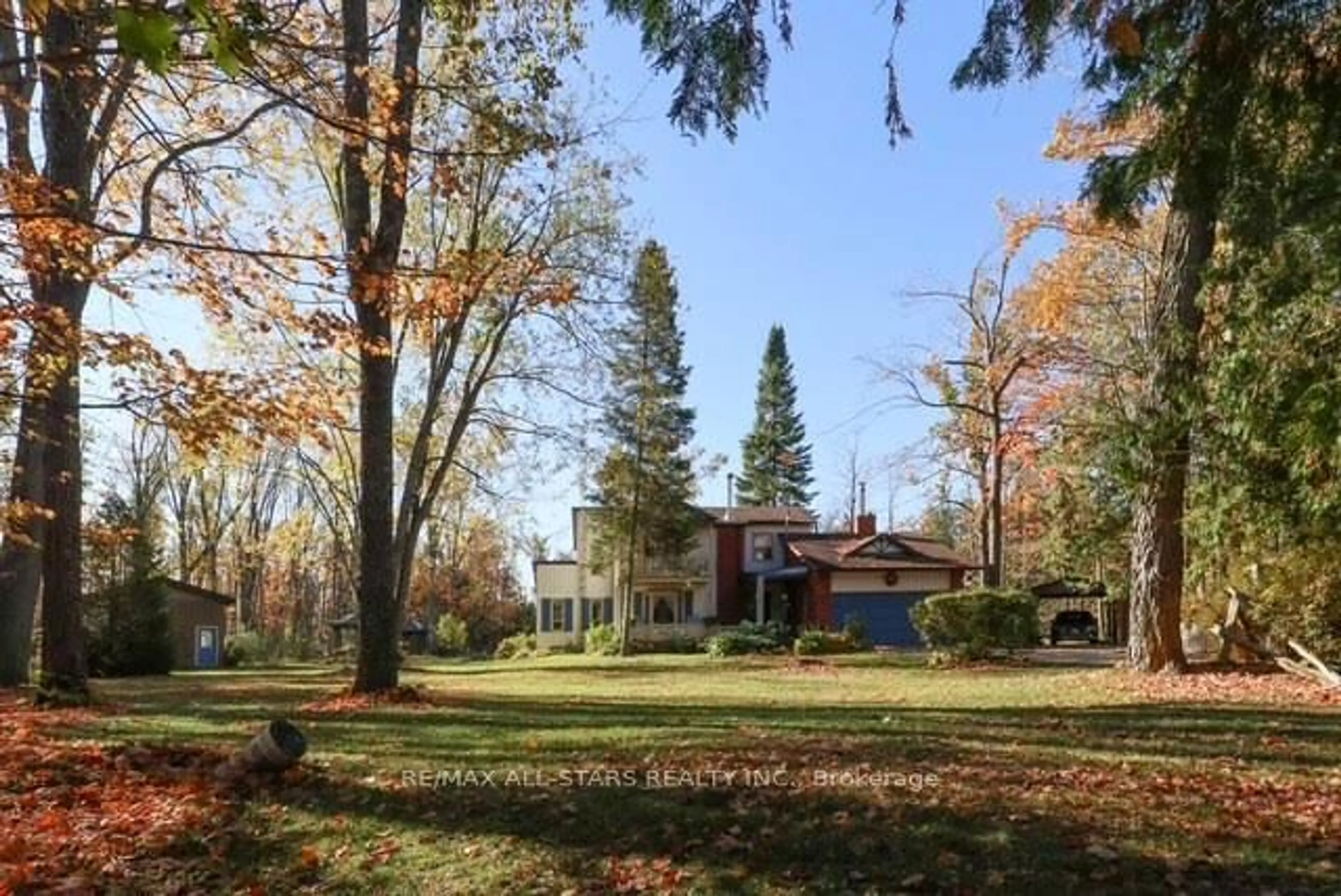 A pic from outside/outdoor area/front of a property/back of a property/a pic from drone, forest/trees view for 506 Snug Harbour Rd, Kawartha Lakes Ontario K9V 4R6