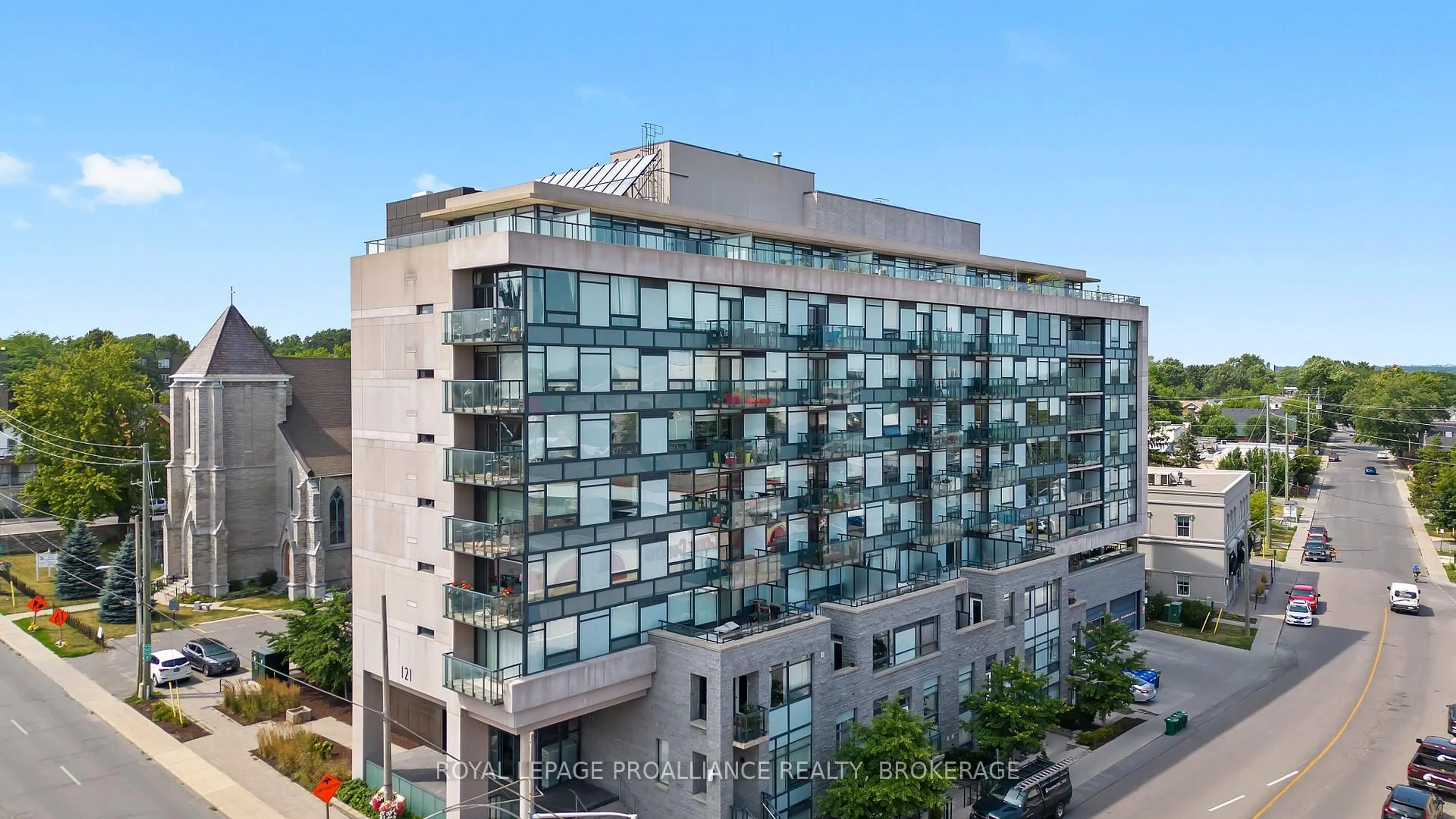 A pic from outside/outdoor area/front of a property/back of a property/a pic from drone, city buildings view from balcony for 121 Queen St #711, Kingston Ontario K7K 0G6