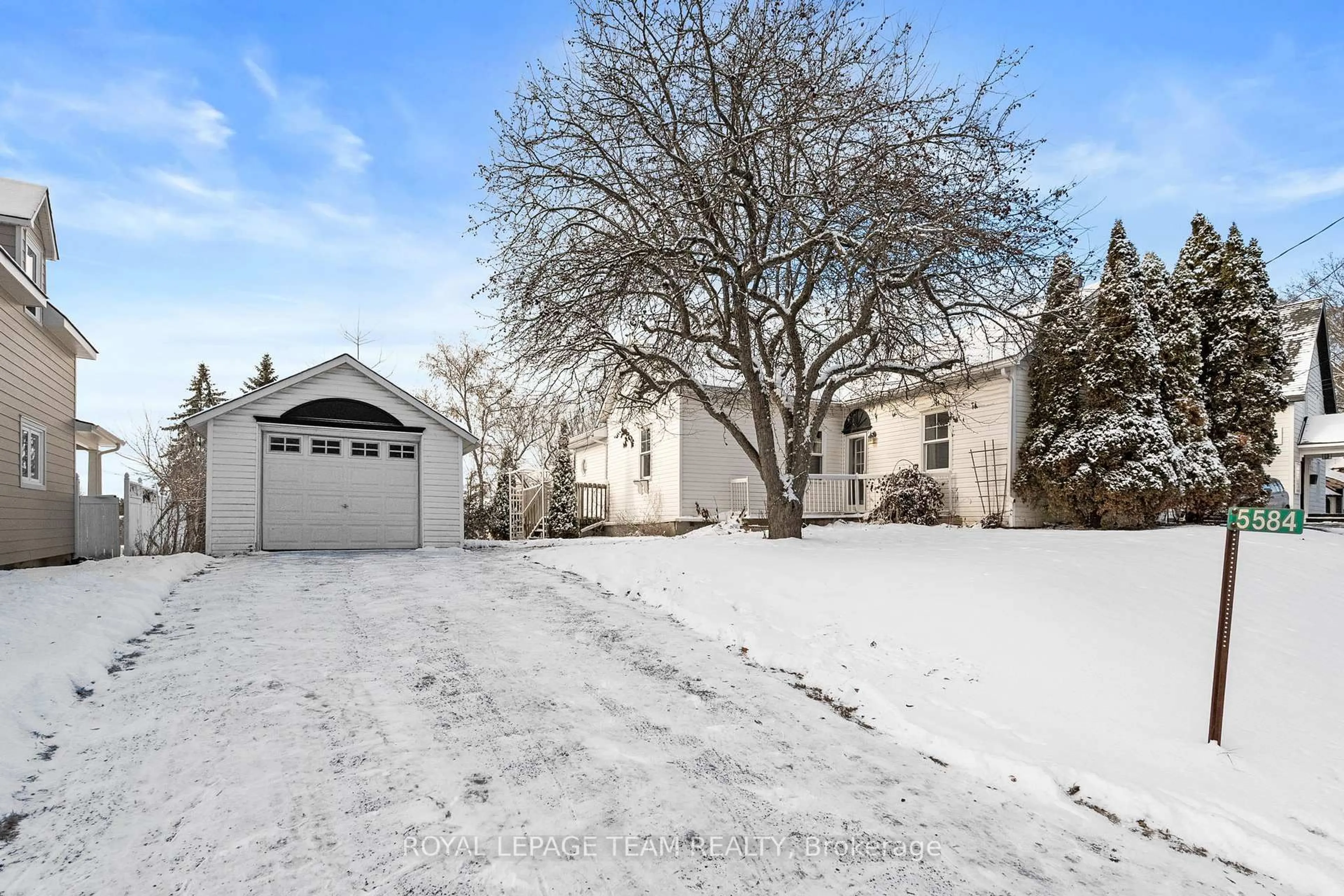 A pic from outside/outdoor area/front of a property/back of a property/a pic from drone, street for 5584 Manotick Main St, Ottawa Ontario K4M 1A4