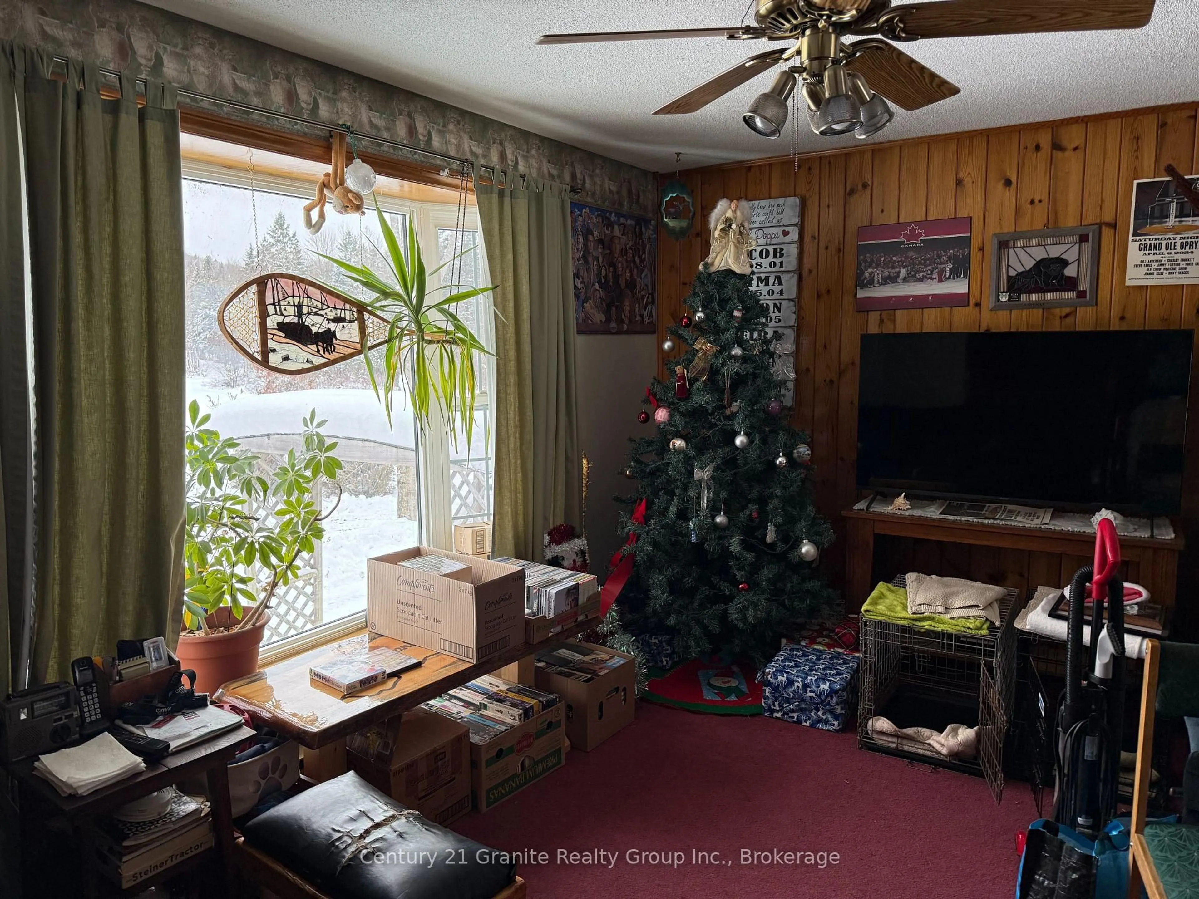 Living room with furniture, wood/laminate floor for 1028 Crabbe Lane, Dysart et al Ontario K0M 1S0