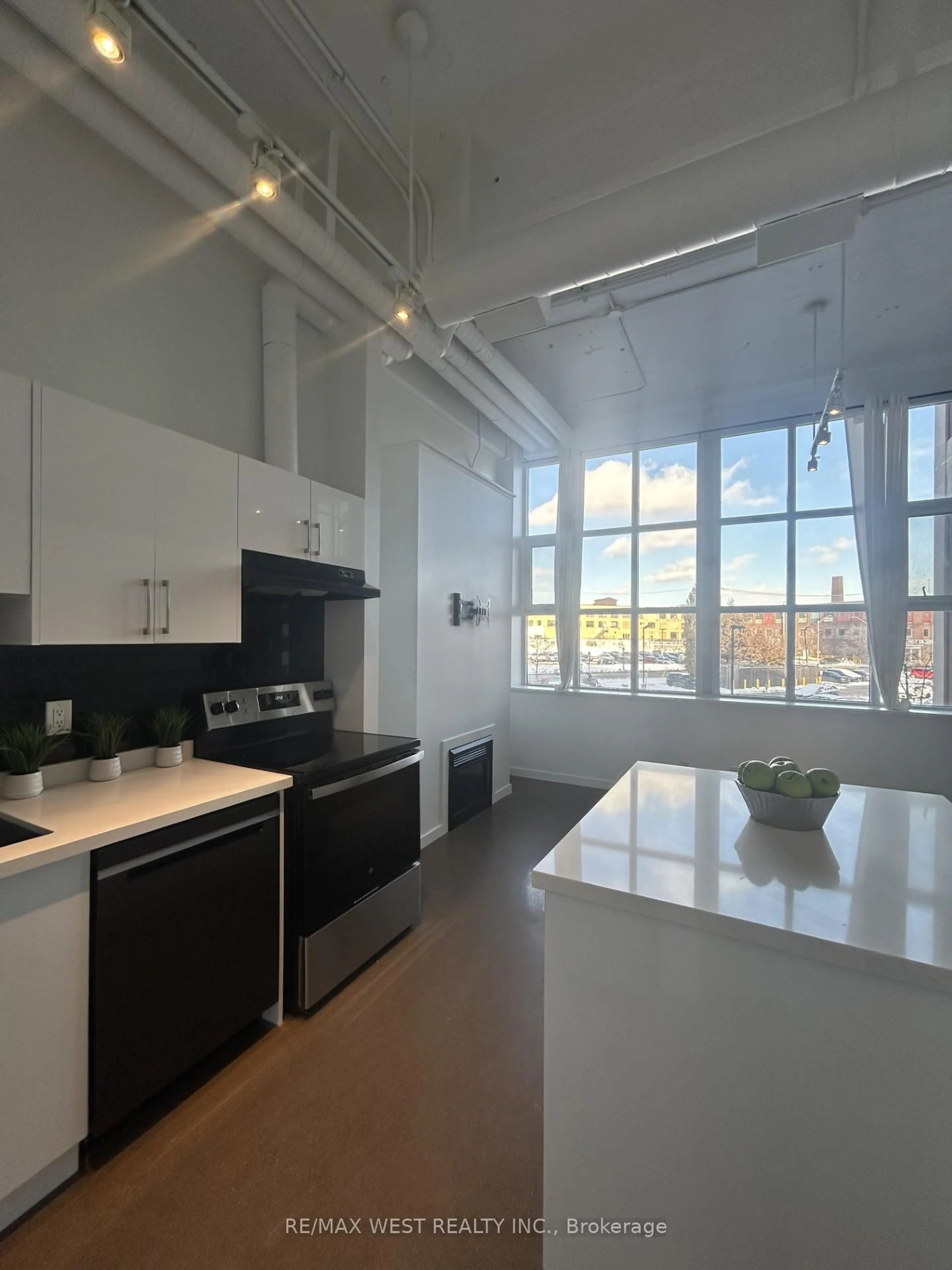 Kitchen with laundary machines, unknown for 410 King St #207, Kitchener Ontario N2G 1C3