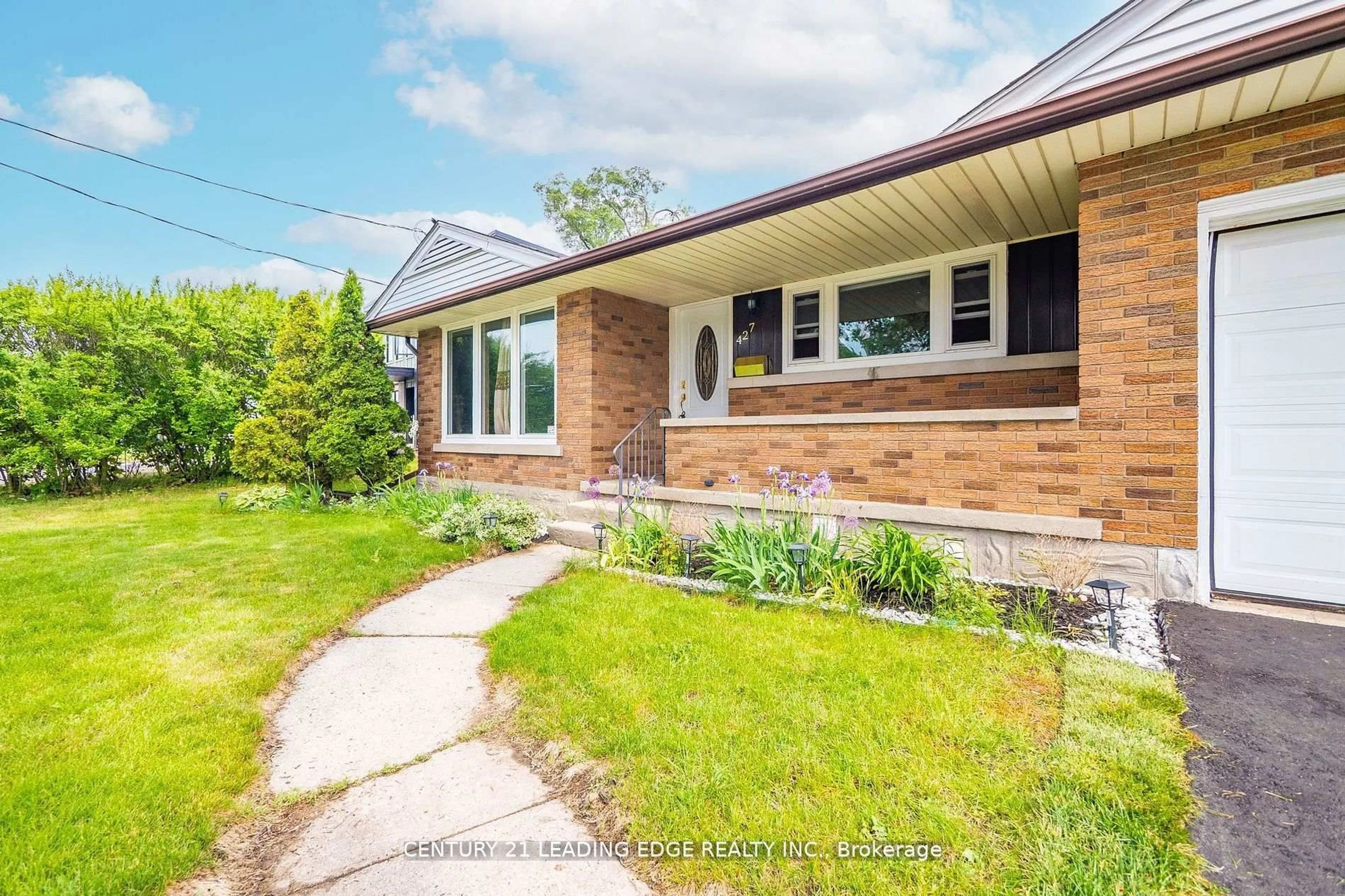 Home with brick exterior material, street for 427 Krug St, Kitchener Ontario N2B 1K9