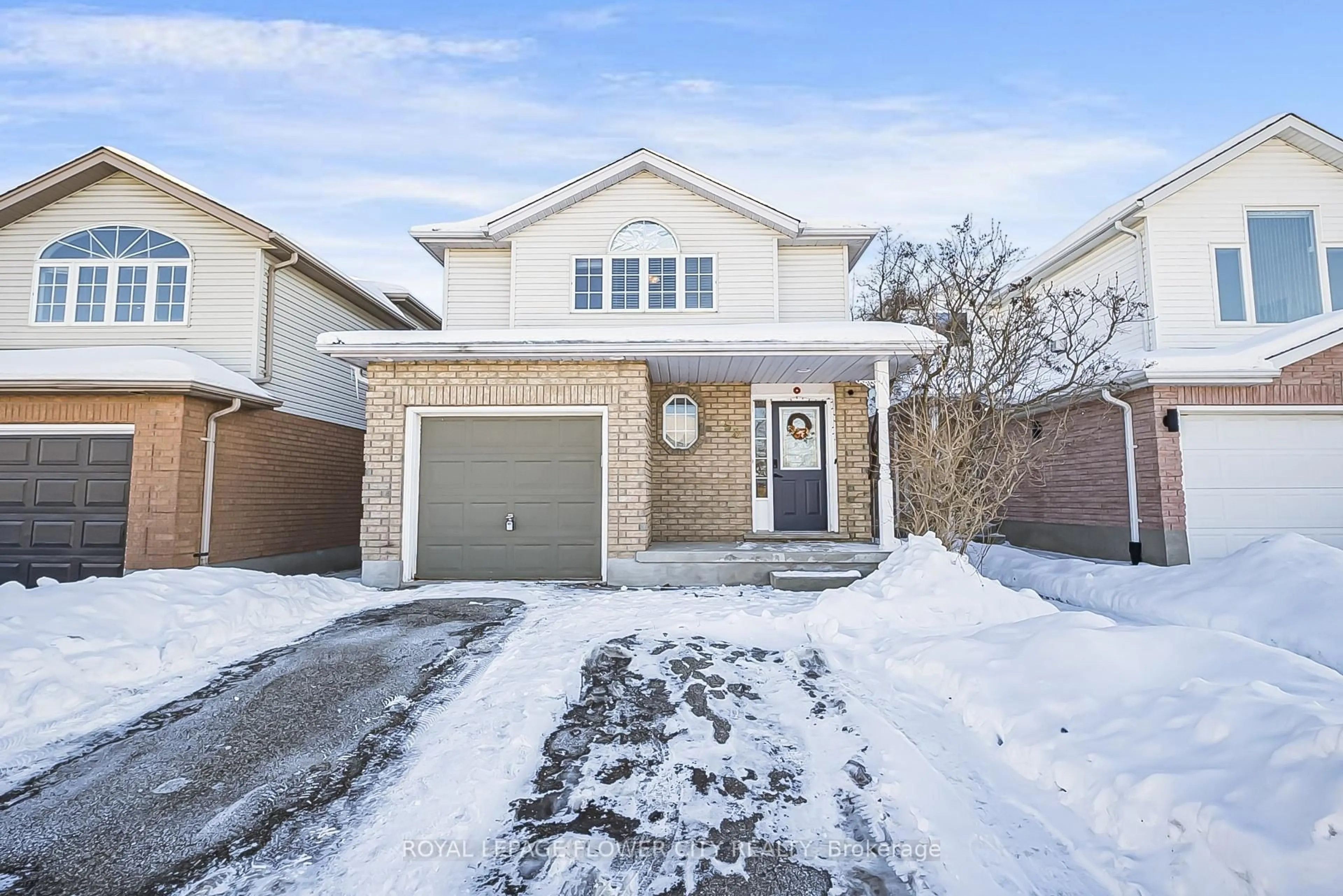 Home with brick exterior material, street for 53 Bush Clover Cres, Kitchener Ontario N2E 3P8