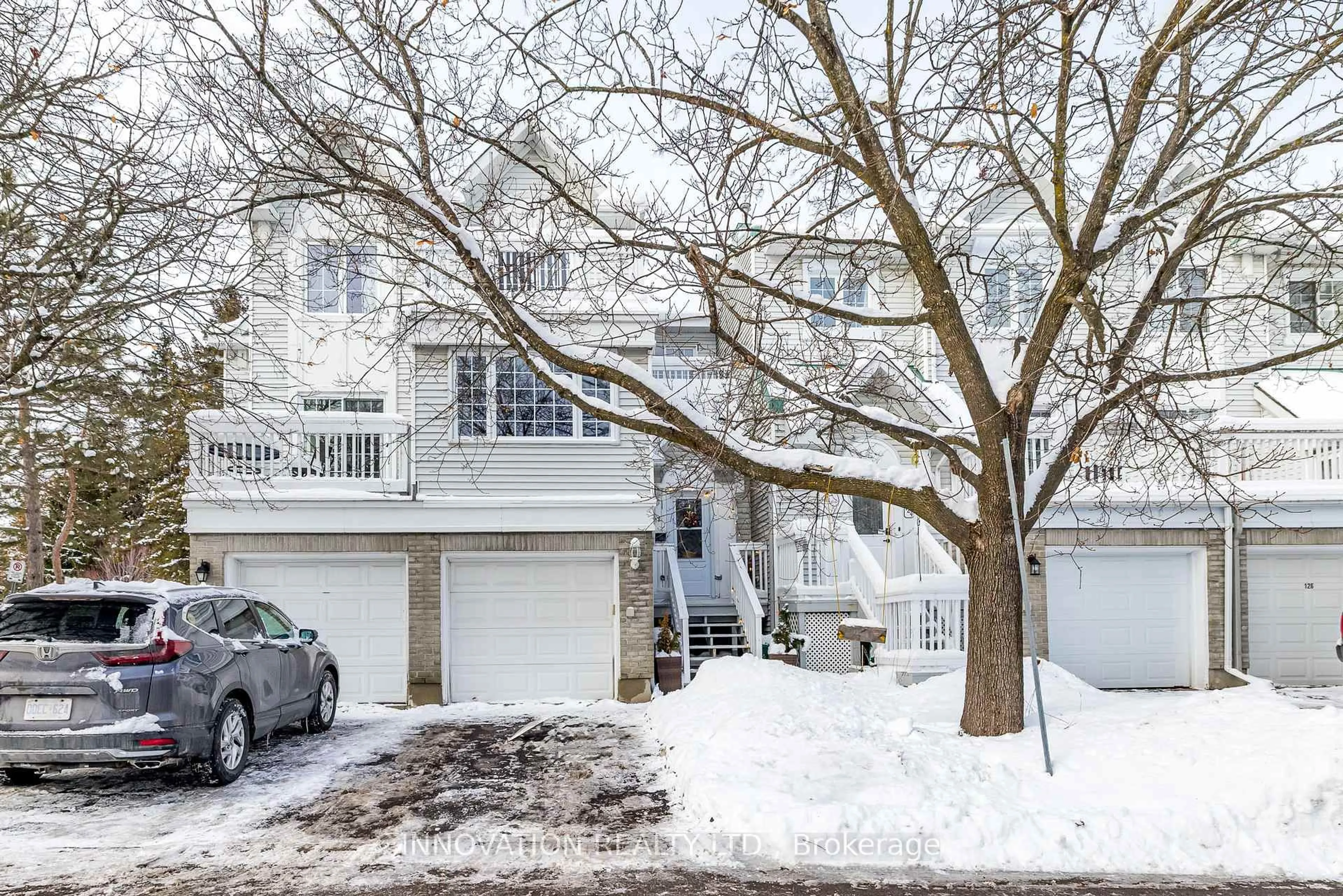 A pic from outside/outdoor area/front of a property/back of a property/a pic from drone, street for 122 Castlegreen Private #58, Ottawa Ontario K1T 3N2