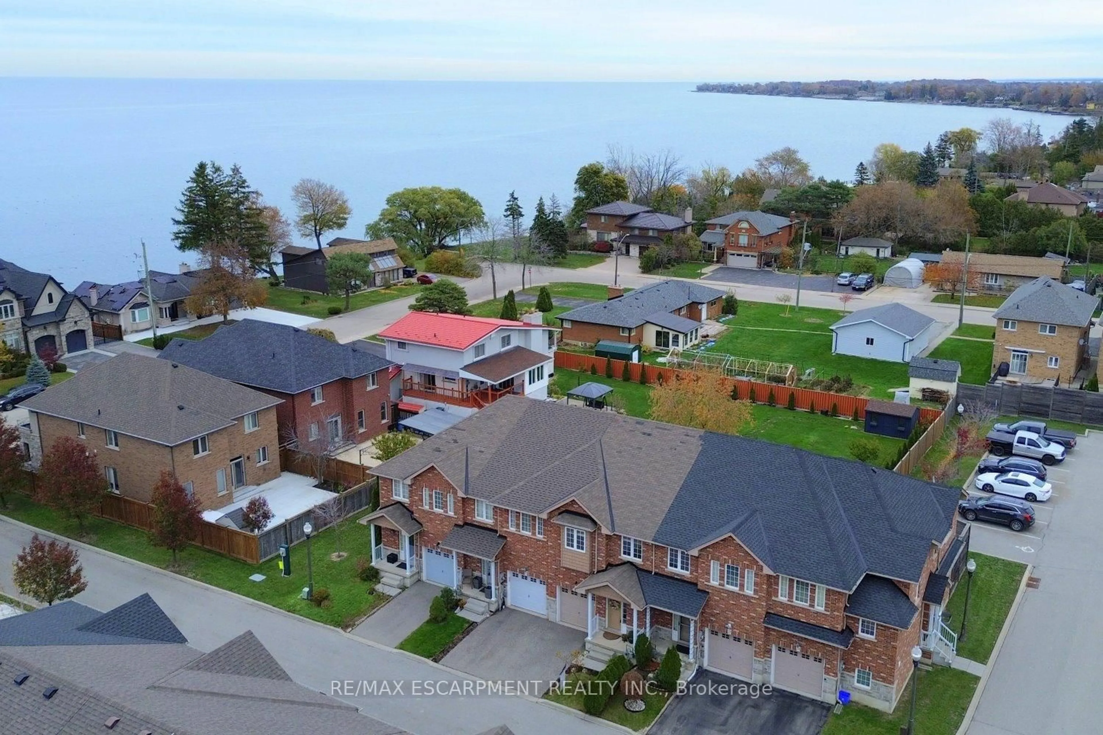 A pic from outside/outdoor area/front of a property/back of a property/a pic from drone, water/lake/river/ocean view for 45 Seabreeze Cres #21, Hamilton Ontario L8E 0G1