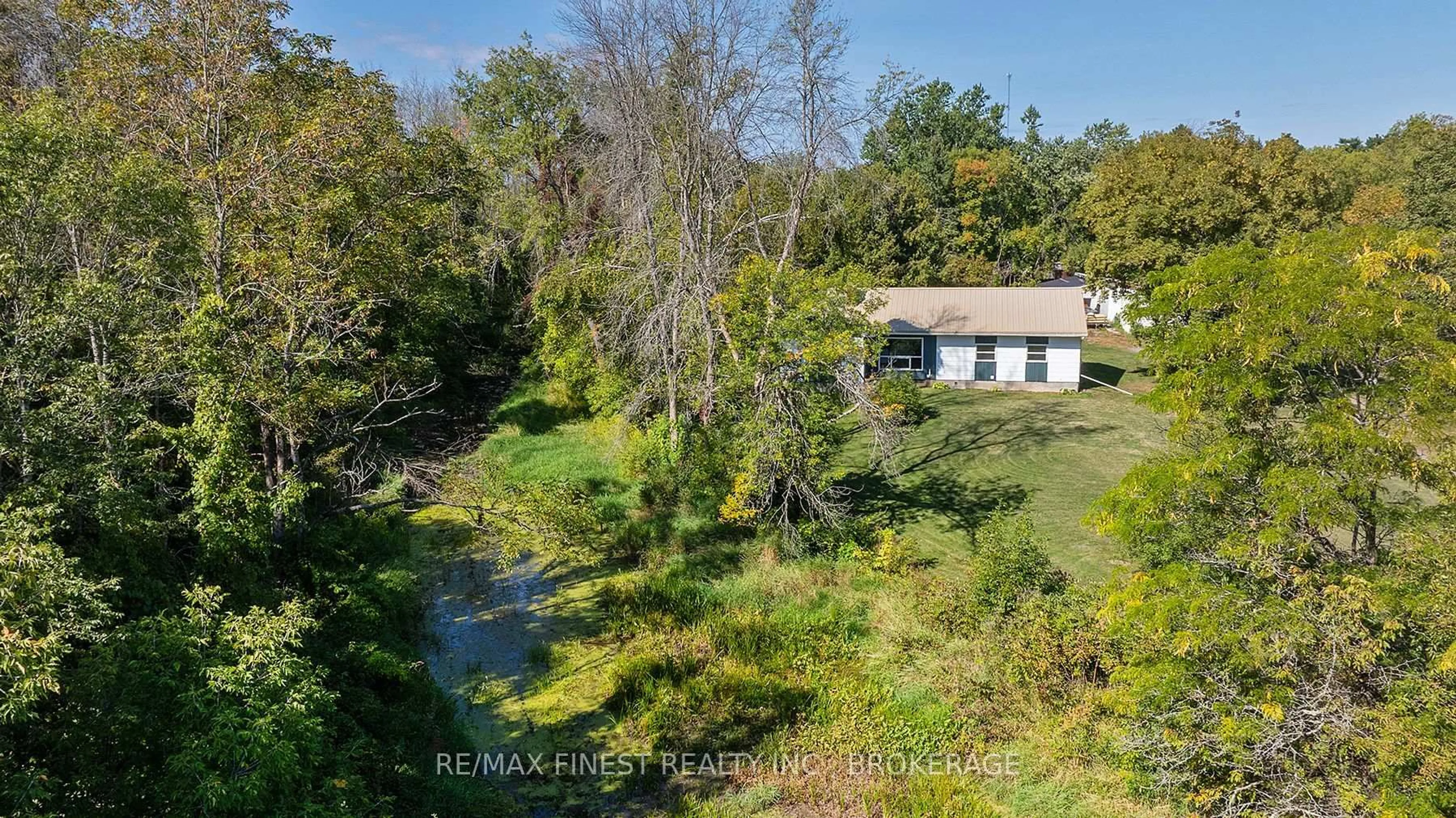 A pic from outside/outdoor area/front of a property/back of a property/a pic from drone, water/lake/river/ocean view for 1523 Lake Rd, Kaladar Ontario K0K 1Z0