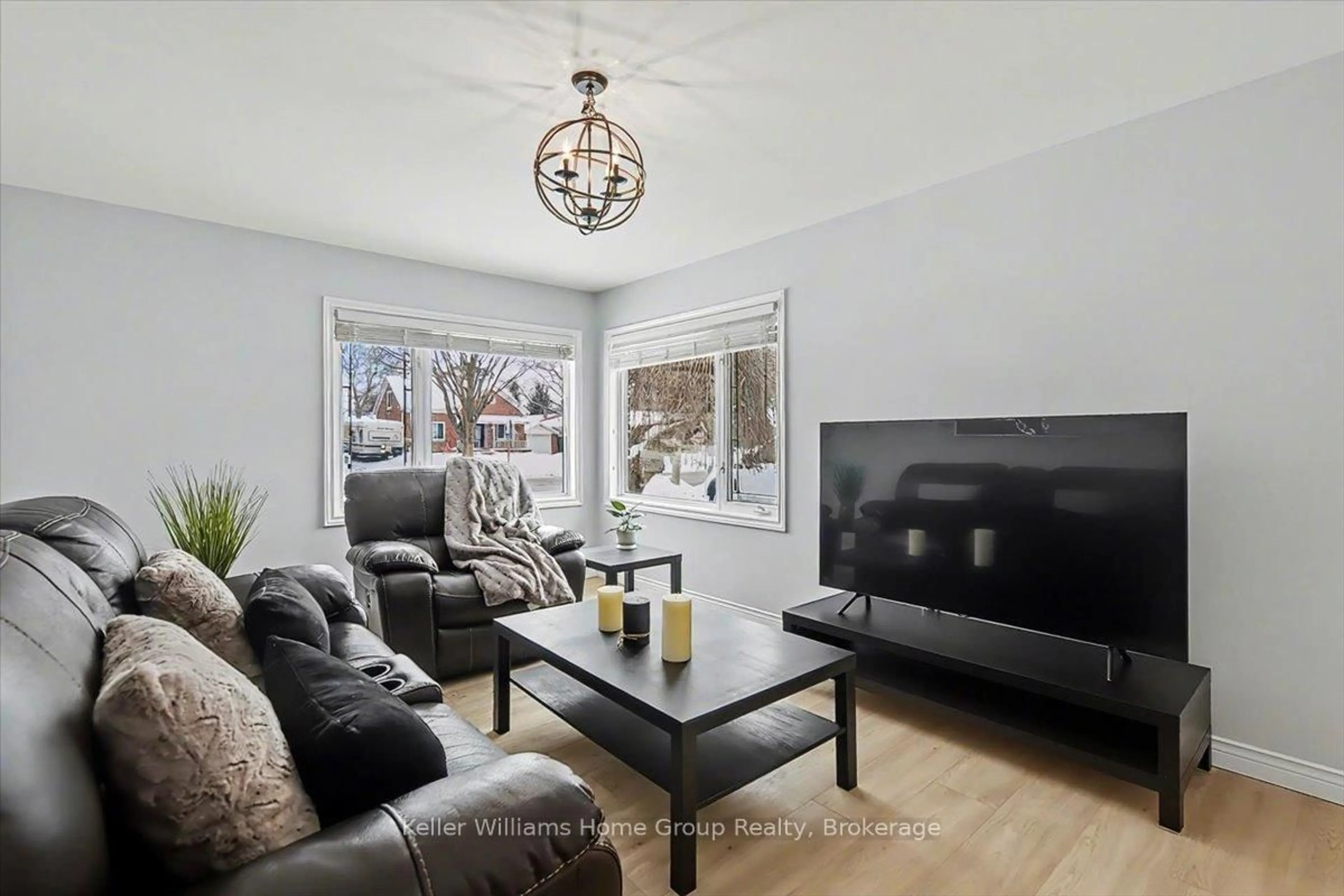 Living room with furniture, wood/laminate floor for 1520 Concession Rd, Cambridge Ontario N3H 4L9