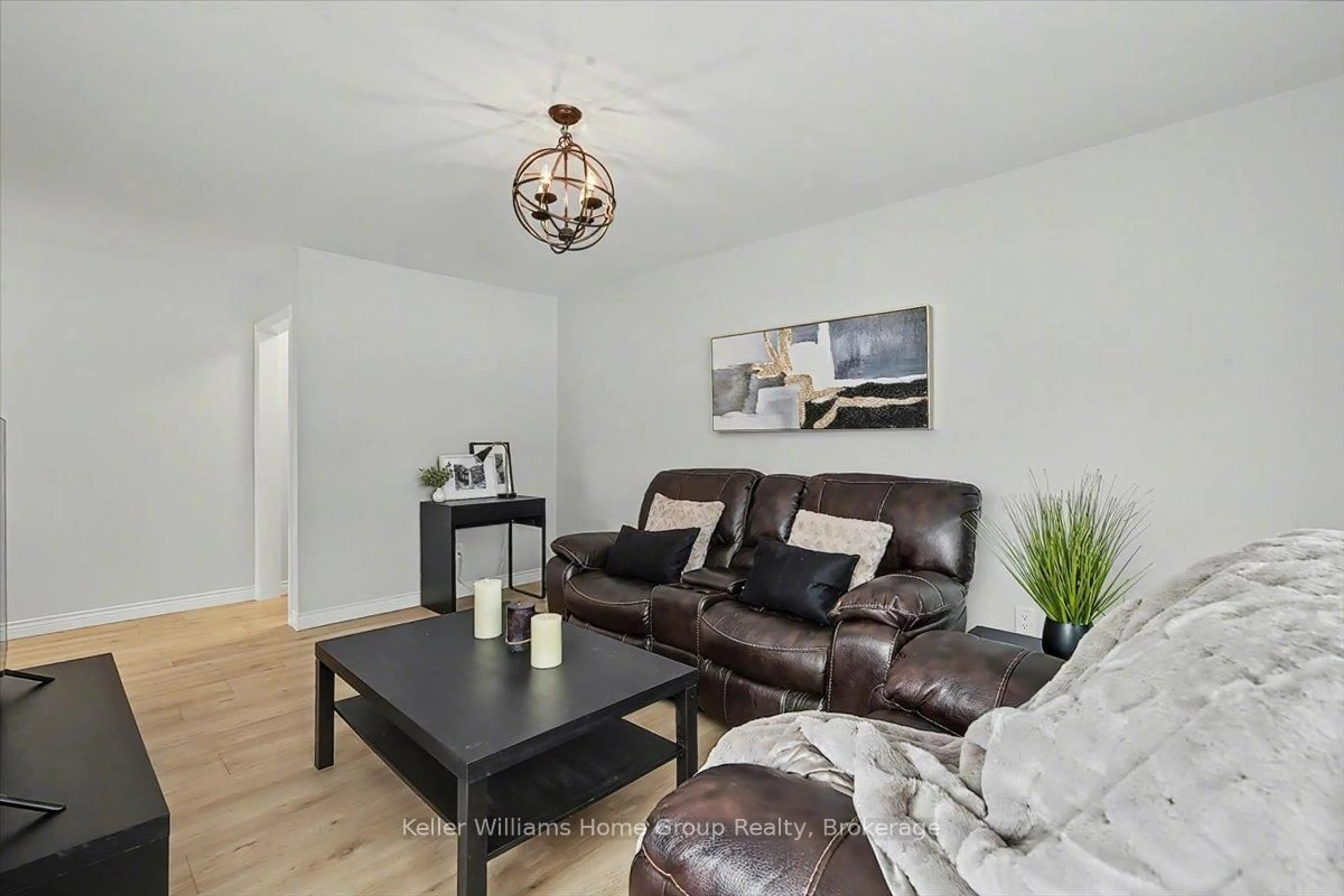 Living room with furniture, wood/laminate floor for 1520 Concession Rd, Cambridge Ontario N3H 4L9
