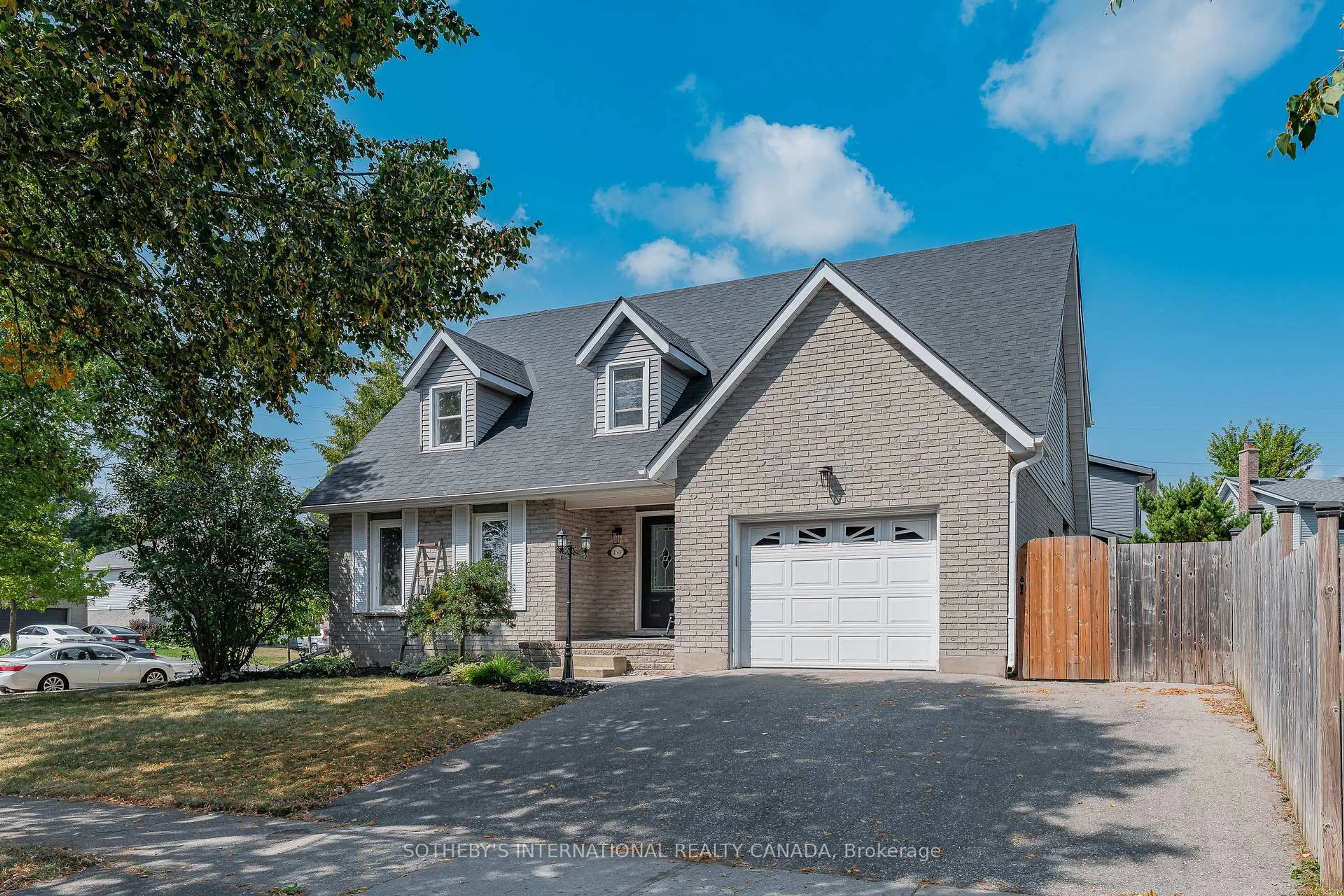 Home with brick exterior material, street for 154 Covington Cres, Kitchener Ontario N2N 2X4