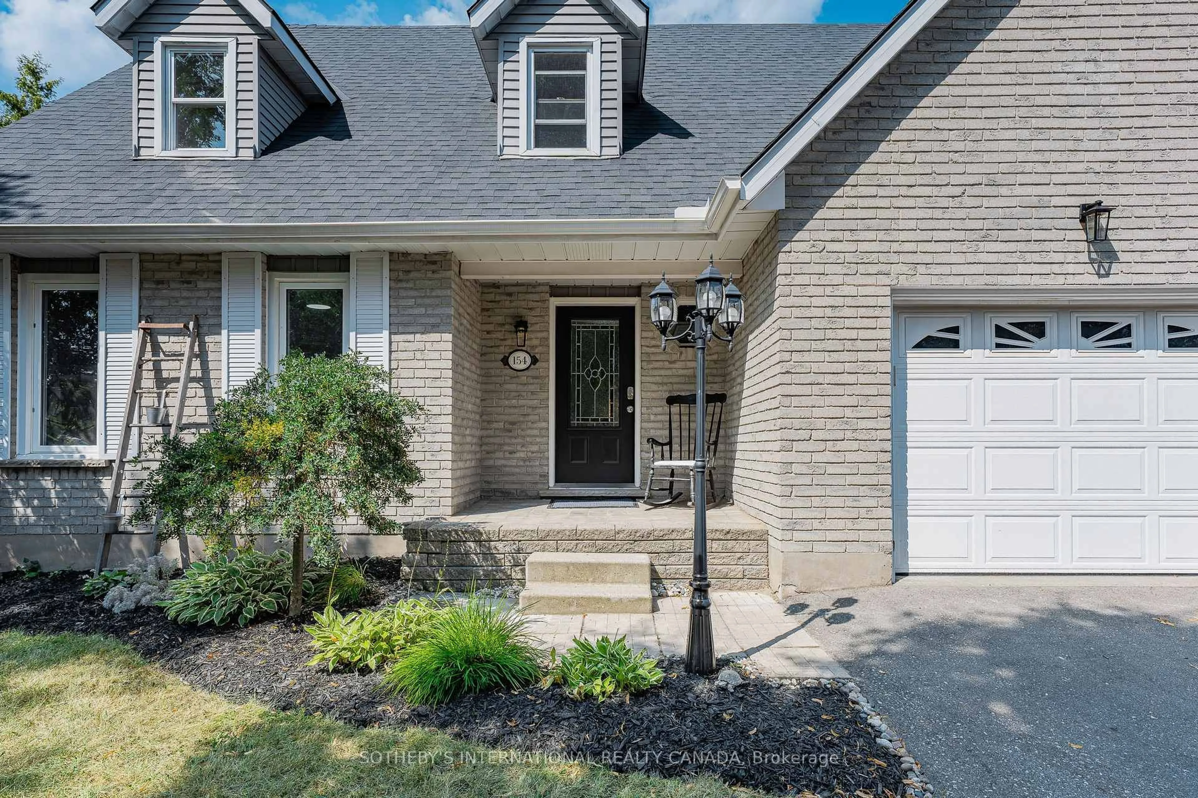 Home with brick exterior material, street for 154 Covington Cres, Kitchener Ontario N2N 2X4