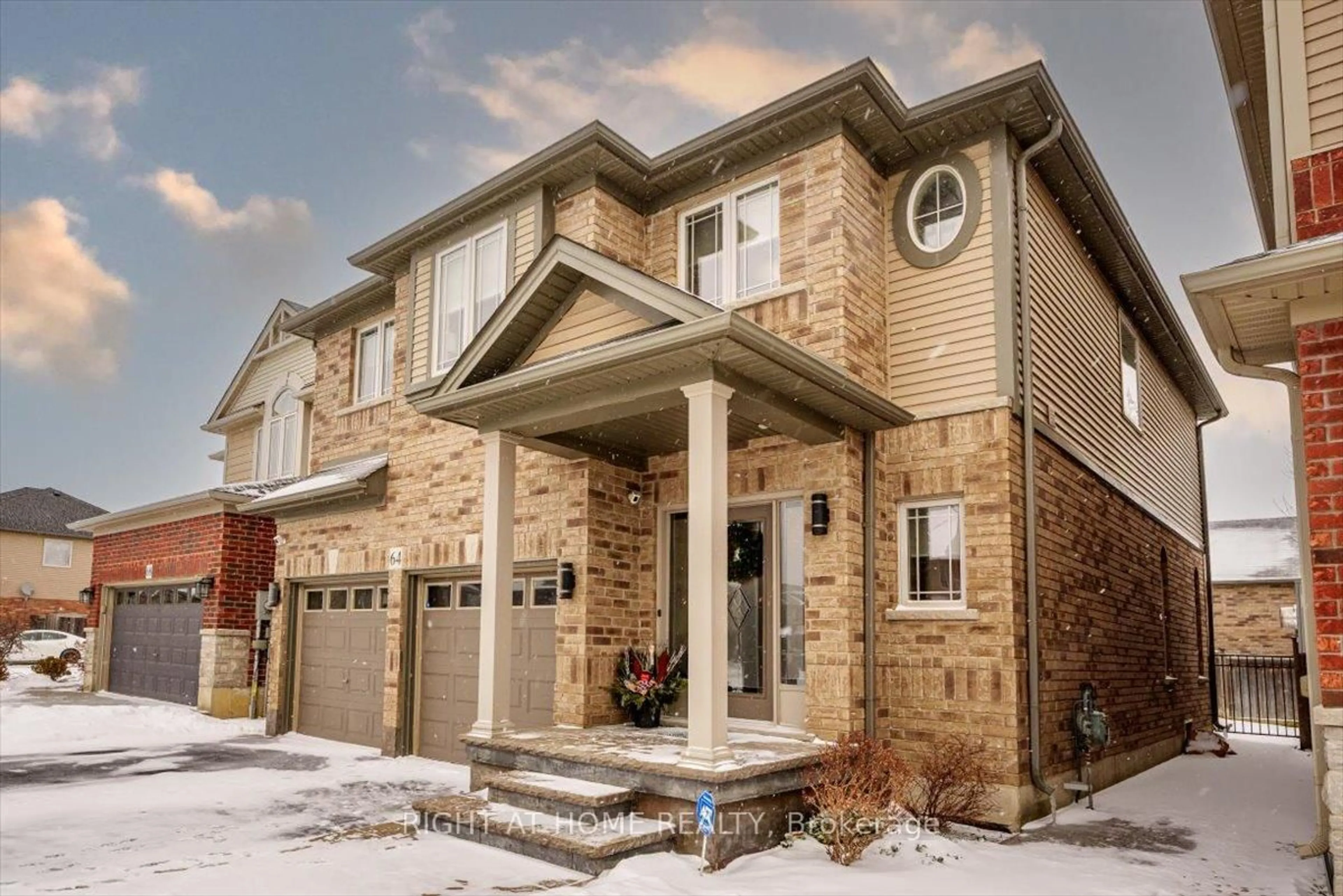 Home with brick exterior material, street for 64 Royal Winter Dr, Hamilton Ontario L0R 1C0
