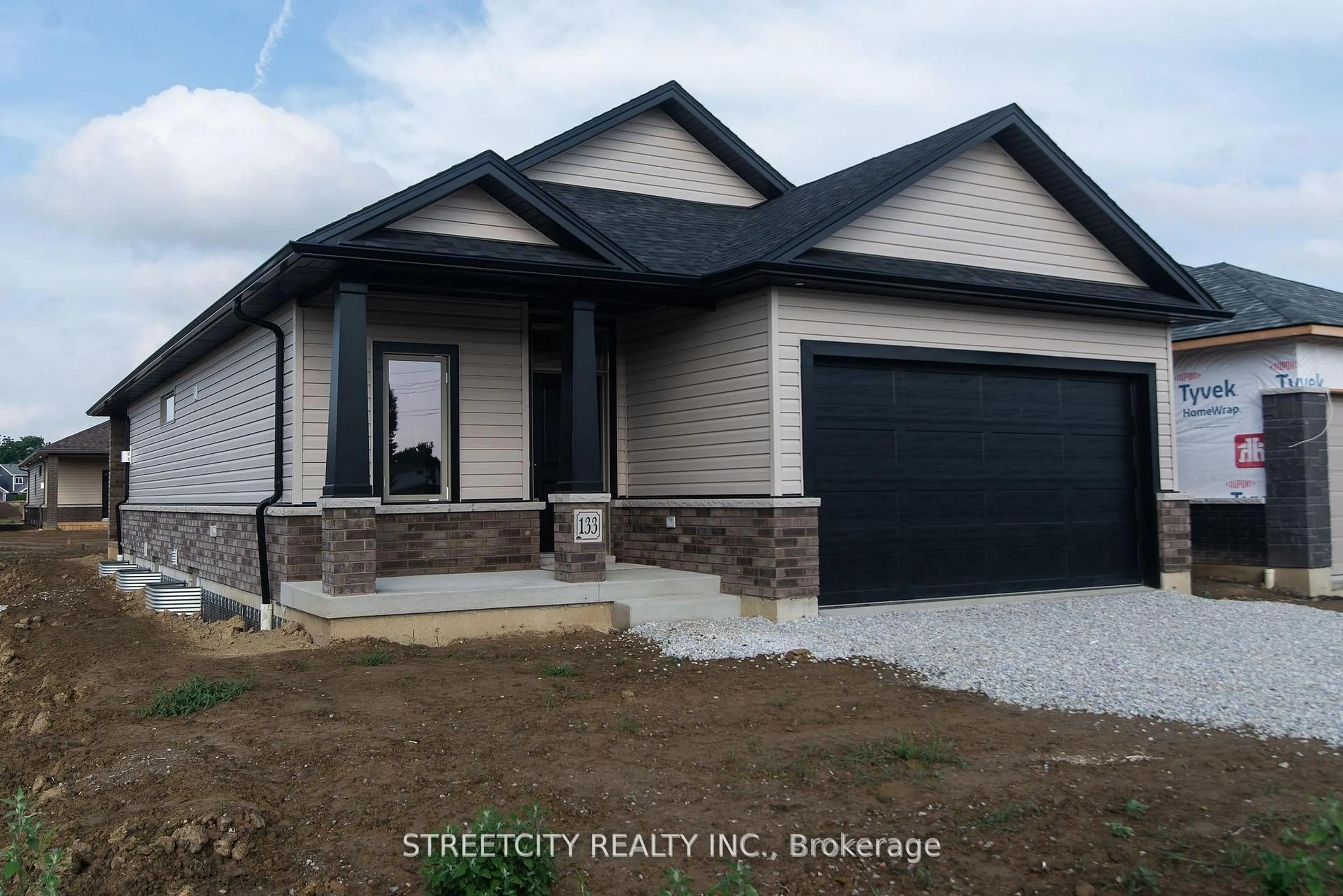 Home with vinyl exterior material, street for 133 CABOT Tr, Chatham-Kent Ontario N7L 0G5