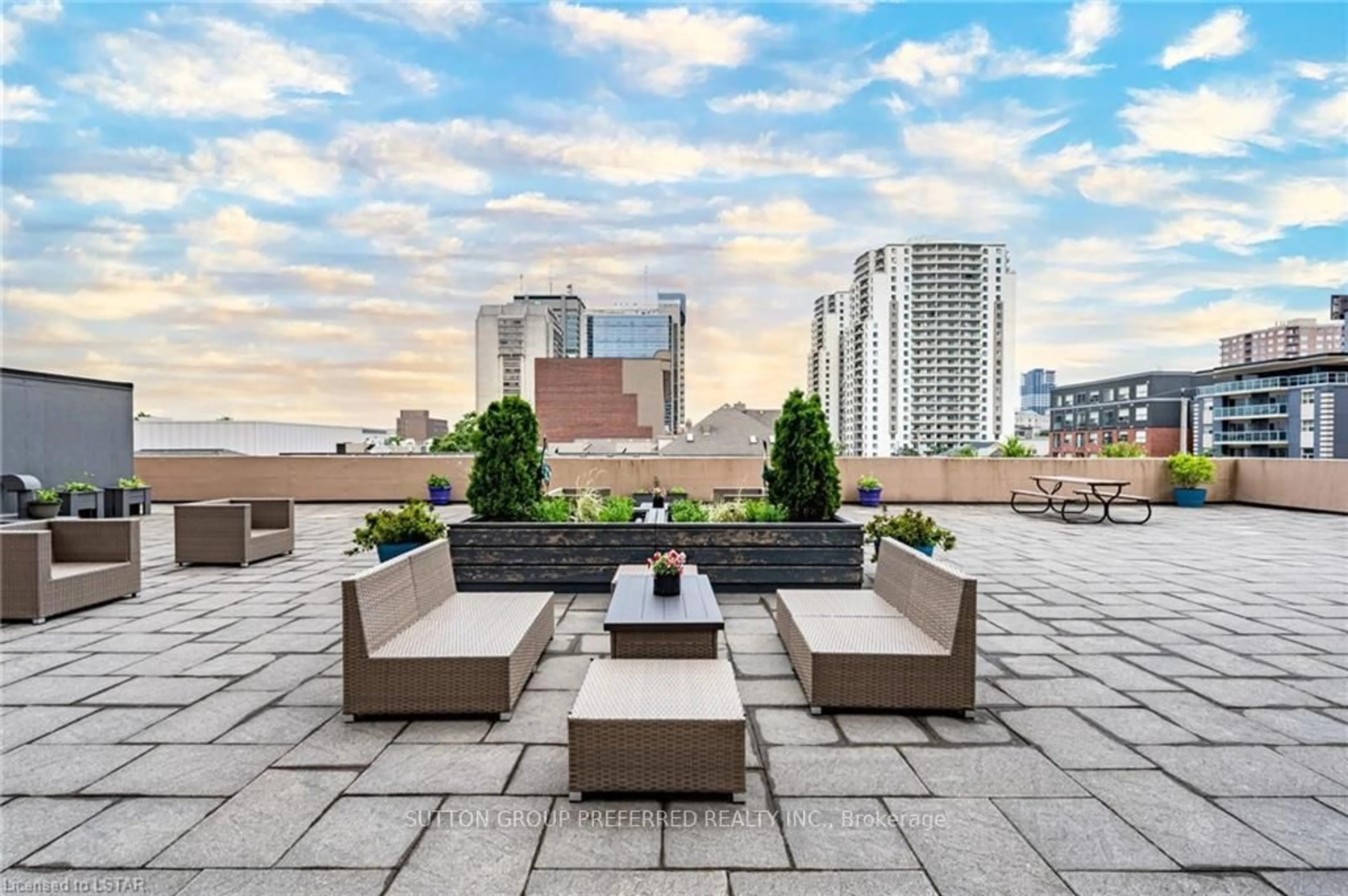 Patio, city buildings view from balcony for 389 Dundas St #2404, London East Ontario N6B 3L5